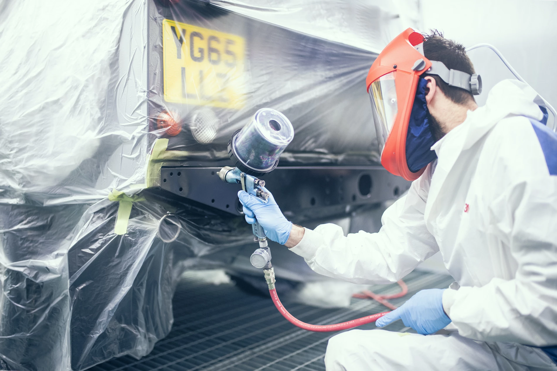 Technicians working in the new LR Coach-works department