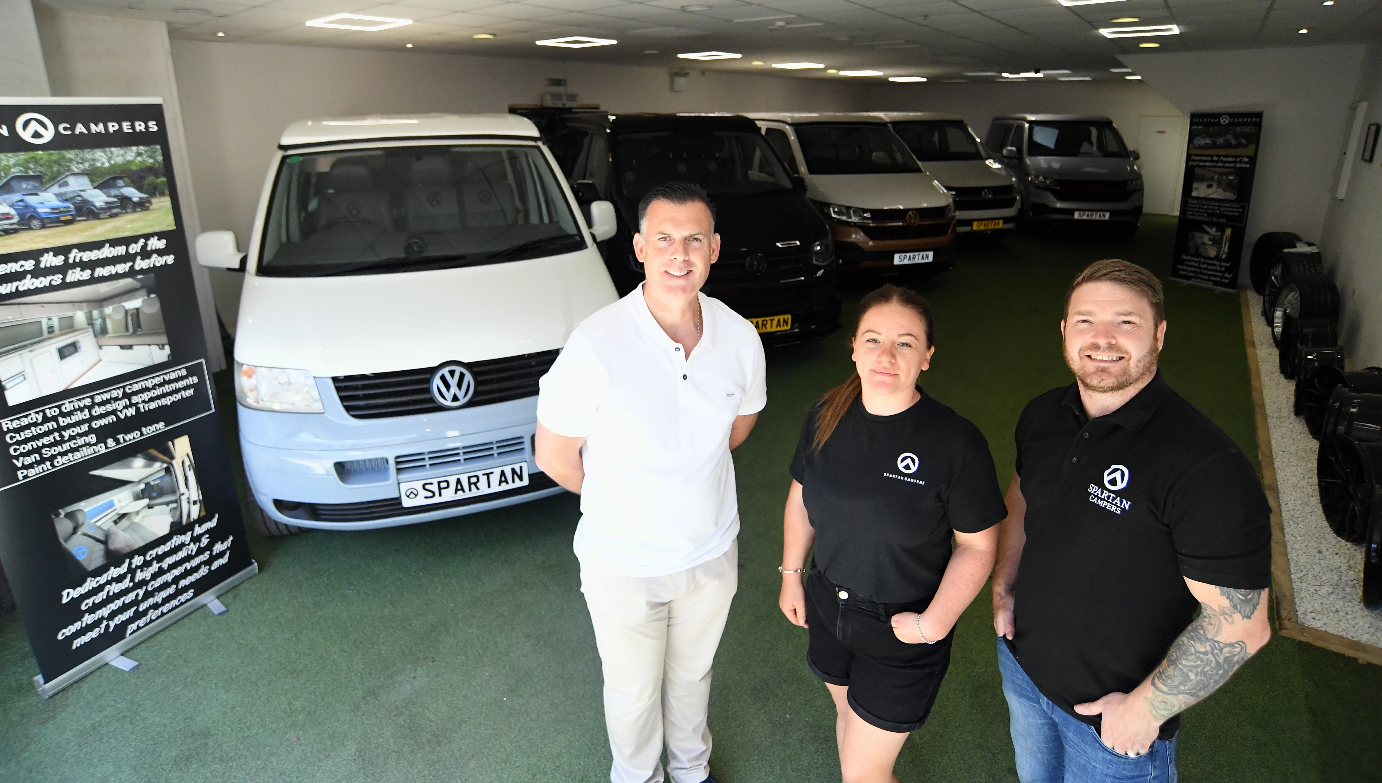 From left: Tony Harris, Spartan Campers Marketing Manager Stacey Barber, and Joe O’Leary at Spartan Campers’ base at The Arches Industrial Estate