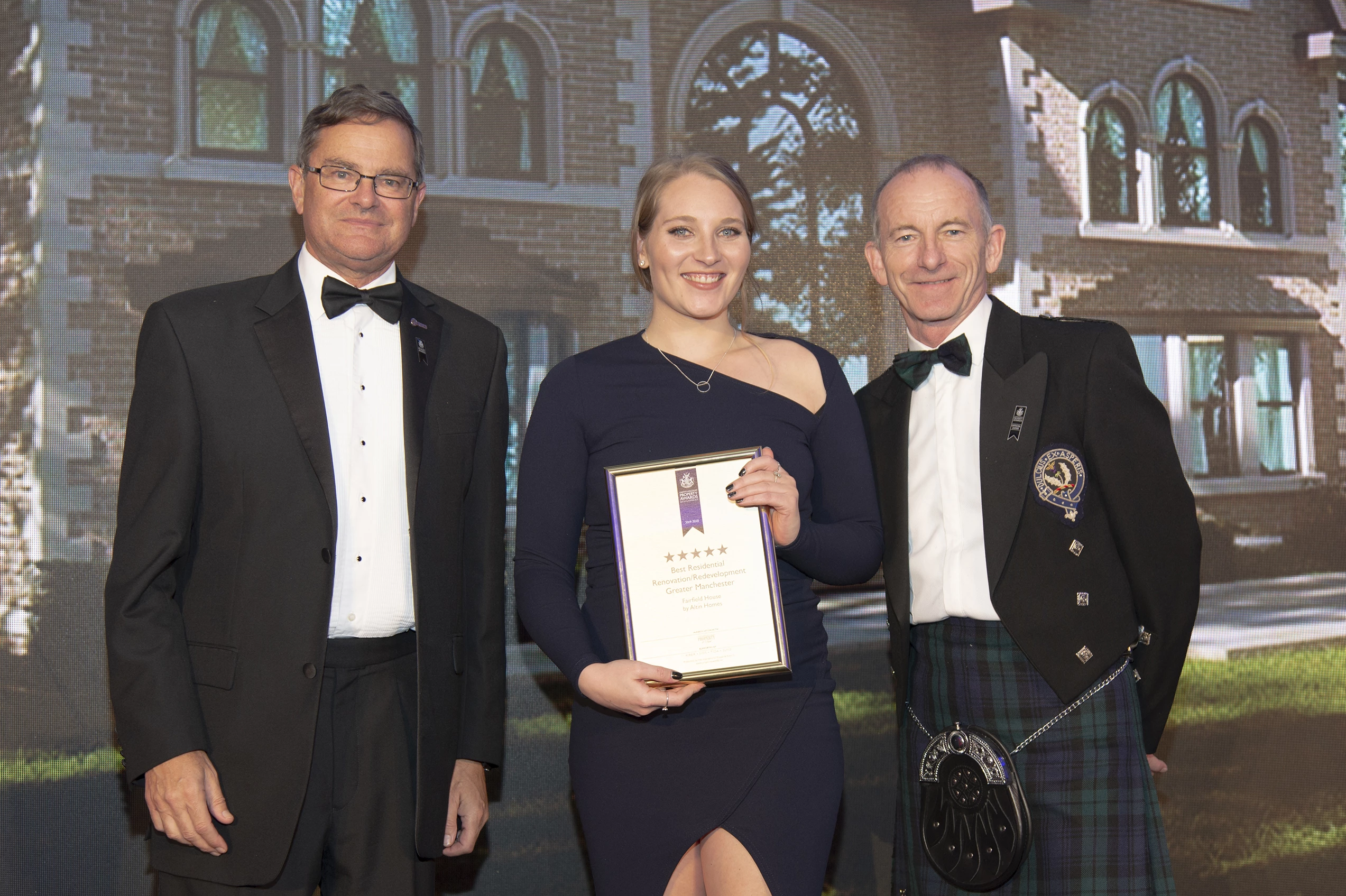 Molly Watson of Altin Homes collecting the award.