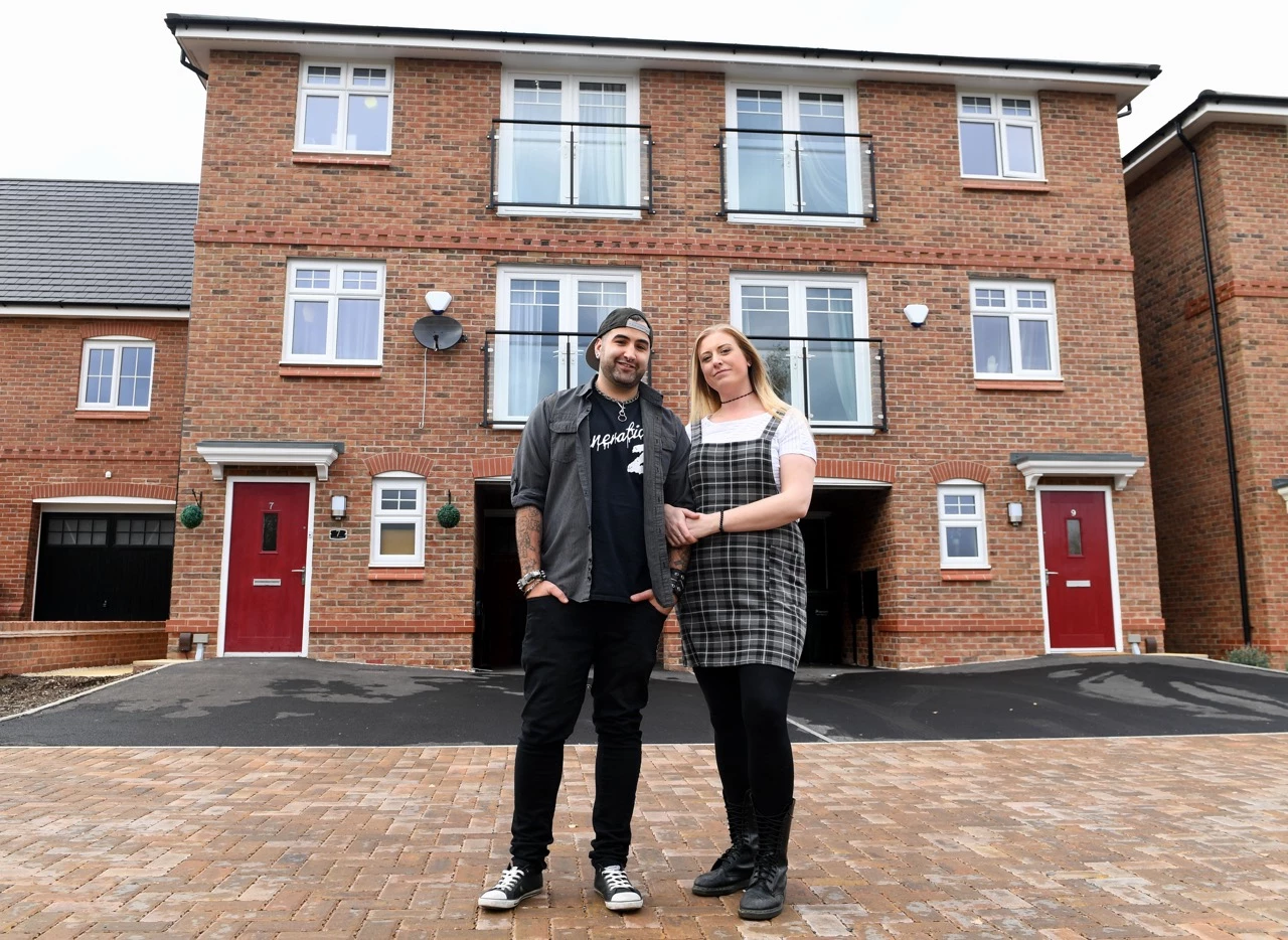 Matt and Alex outside their Tamar home