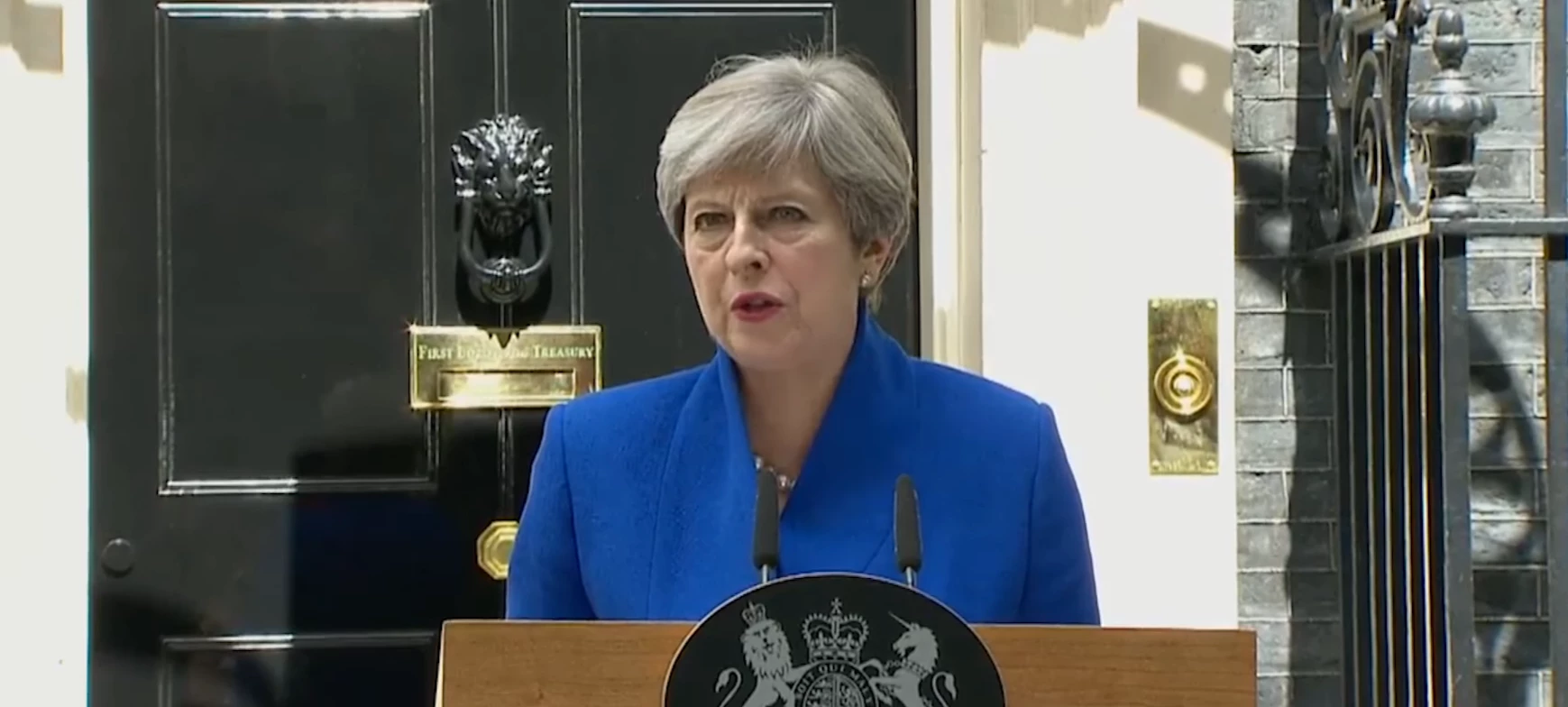 Theresa May on the steps of Downing Street.