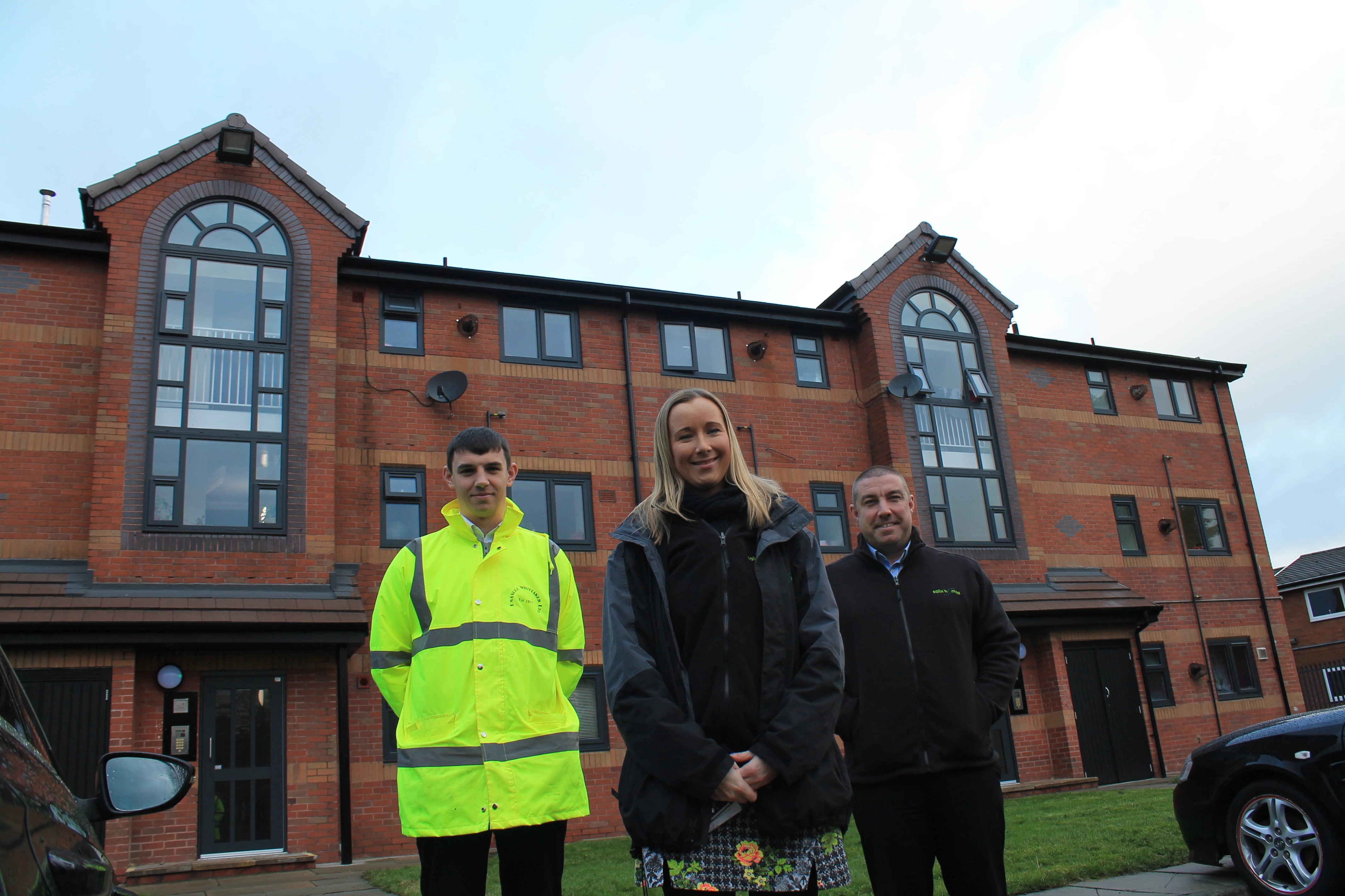 Ryan Whittaker, from Emanuel Whittaker, with Laura Derbyshire and Martin Parr, from Salix Homes, at the new-look Carmel Avenue.