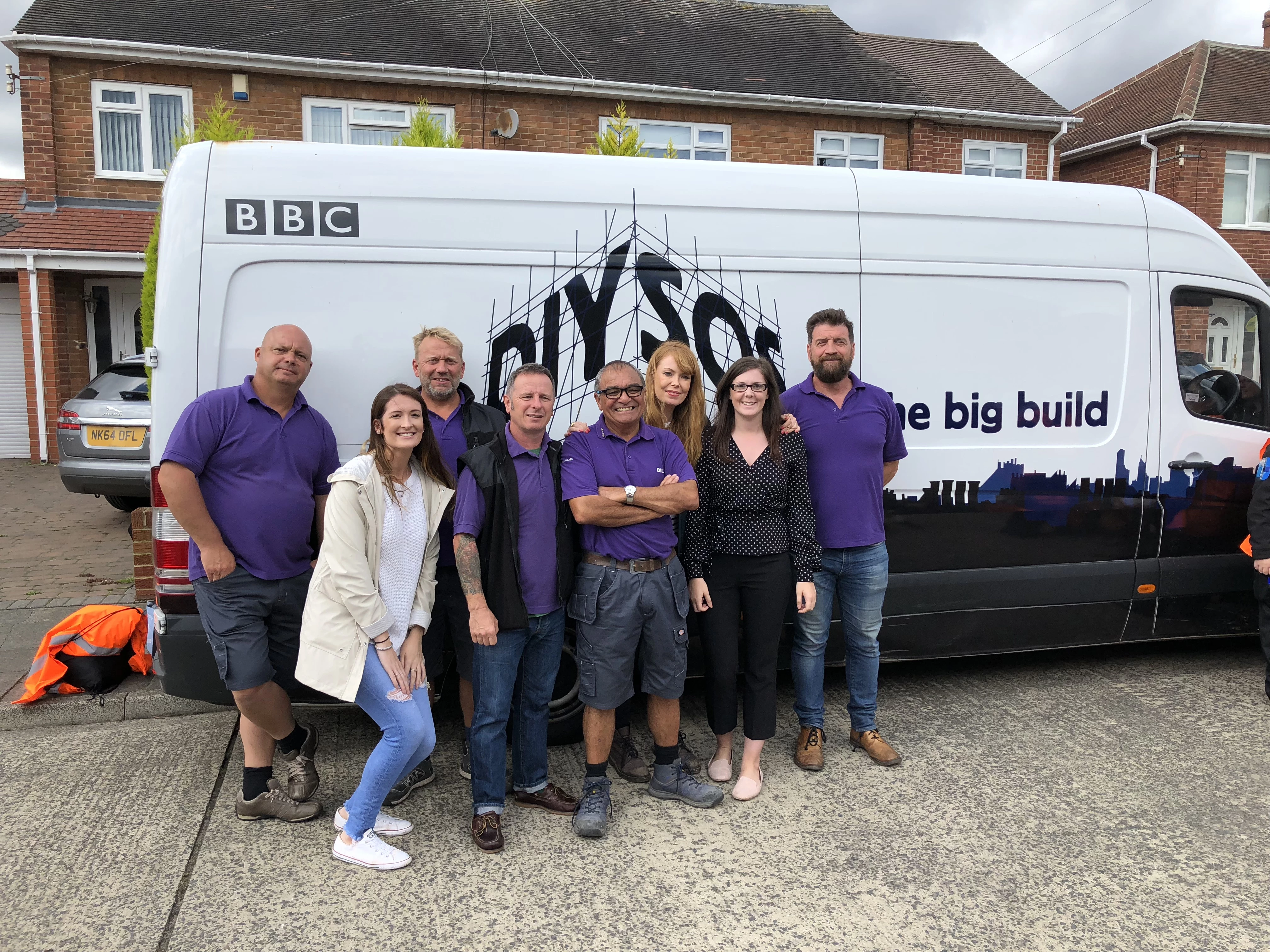 The P C Henderson marketing team with the DIY SOS presenters