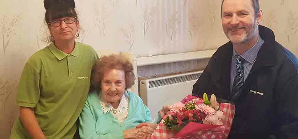 (L-R) Alison Mitchell, Merry Maids; Mrs Clarke & Ian Stringer, director of Merry Maids Bromley & Orpington.