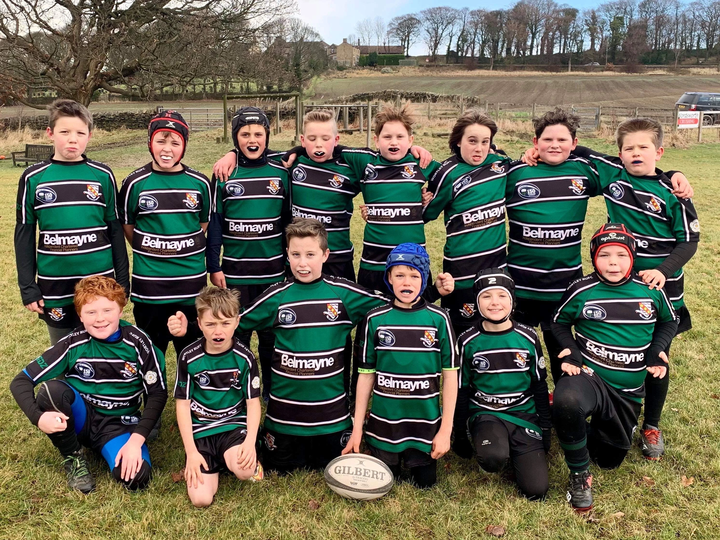 Wortley RUFC's under 11s team sporting their Belmayne sponsored shirts. 