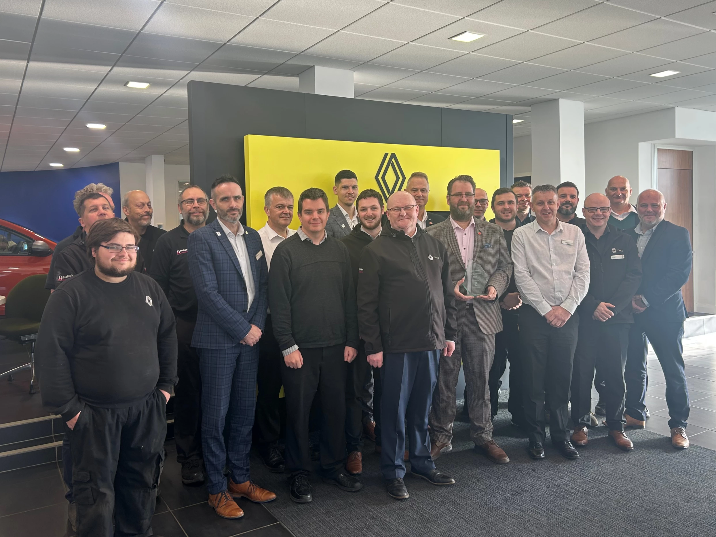 Rob Wood (centre) and the team at Holden Renault