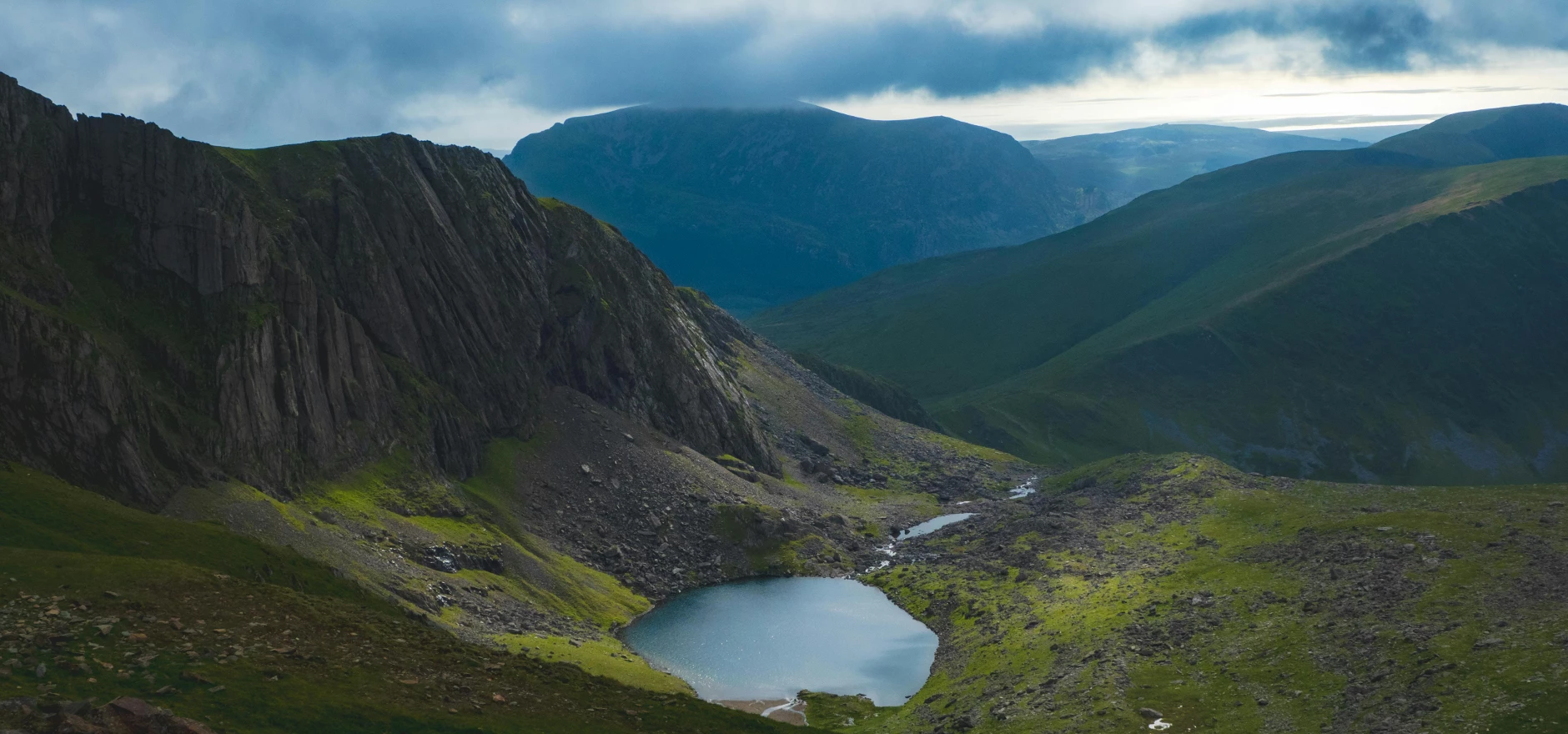 Lake in Valley among Hills