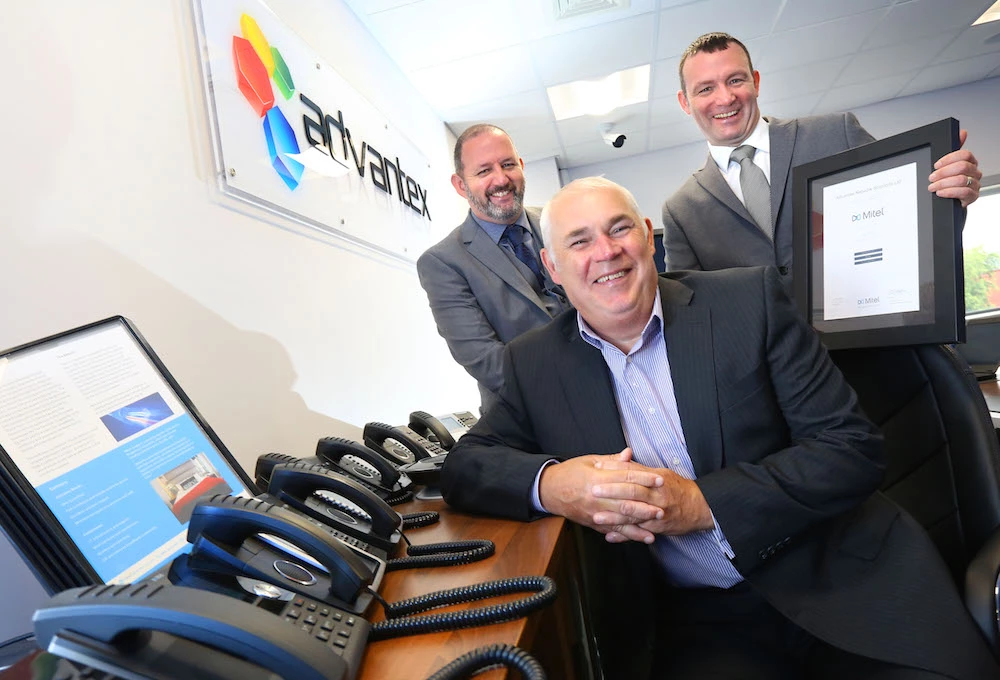 Advantex’s Dave and Steve O’Connell (back row, l-r) with Mitel’s Glenn Thompson