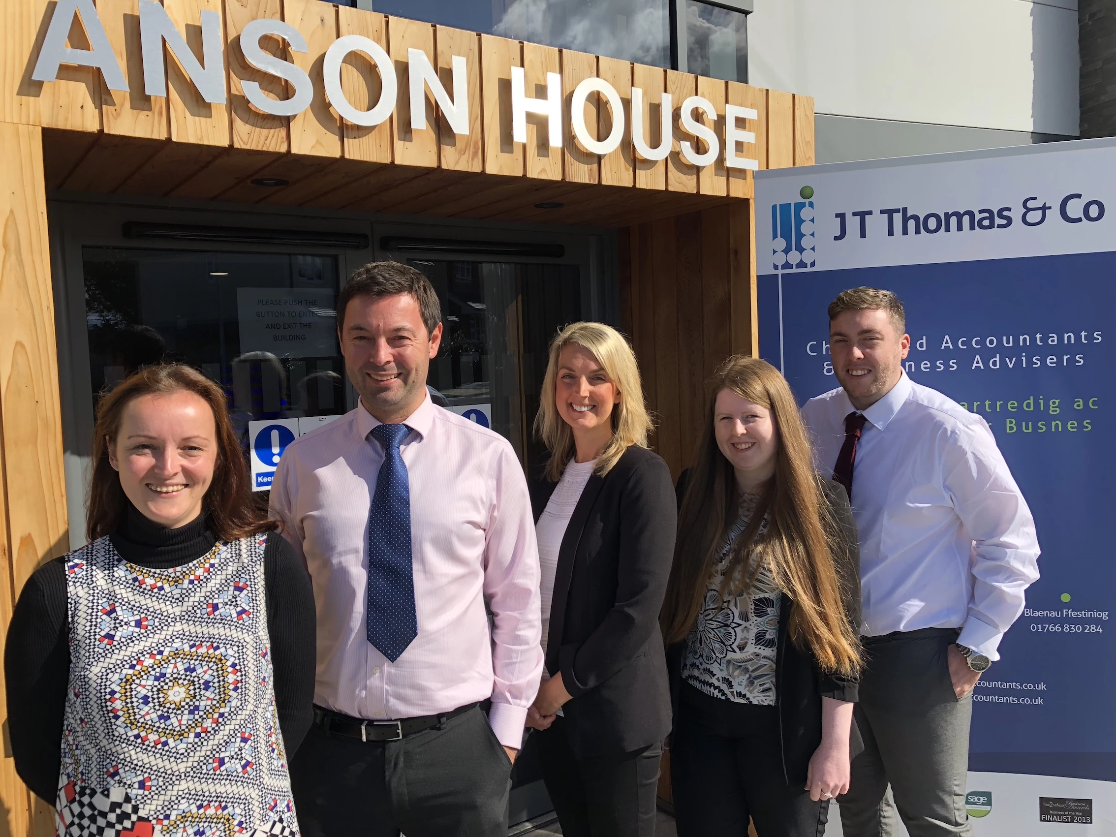 JT Thomas & Co move to Llandudno Junction (from left to right)/ Amy Jones and her brother Max Thomas, alongside wife Natalie Thomas, joined by colleagues Sara MacDonald and Gareth Williams.  