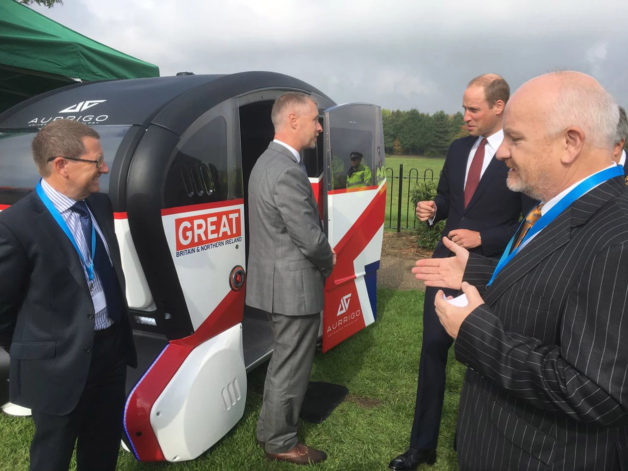 RDM’s Miles Garner showcases the company’s driverless pod to Prince William 