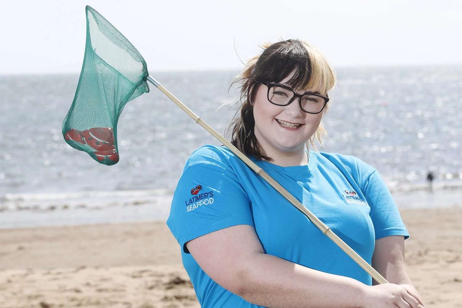 Sophie Gray from Latimer's Seafood with Claude the crab