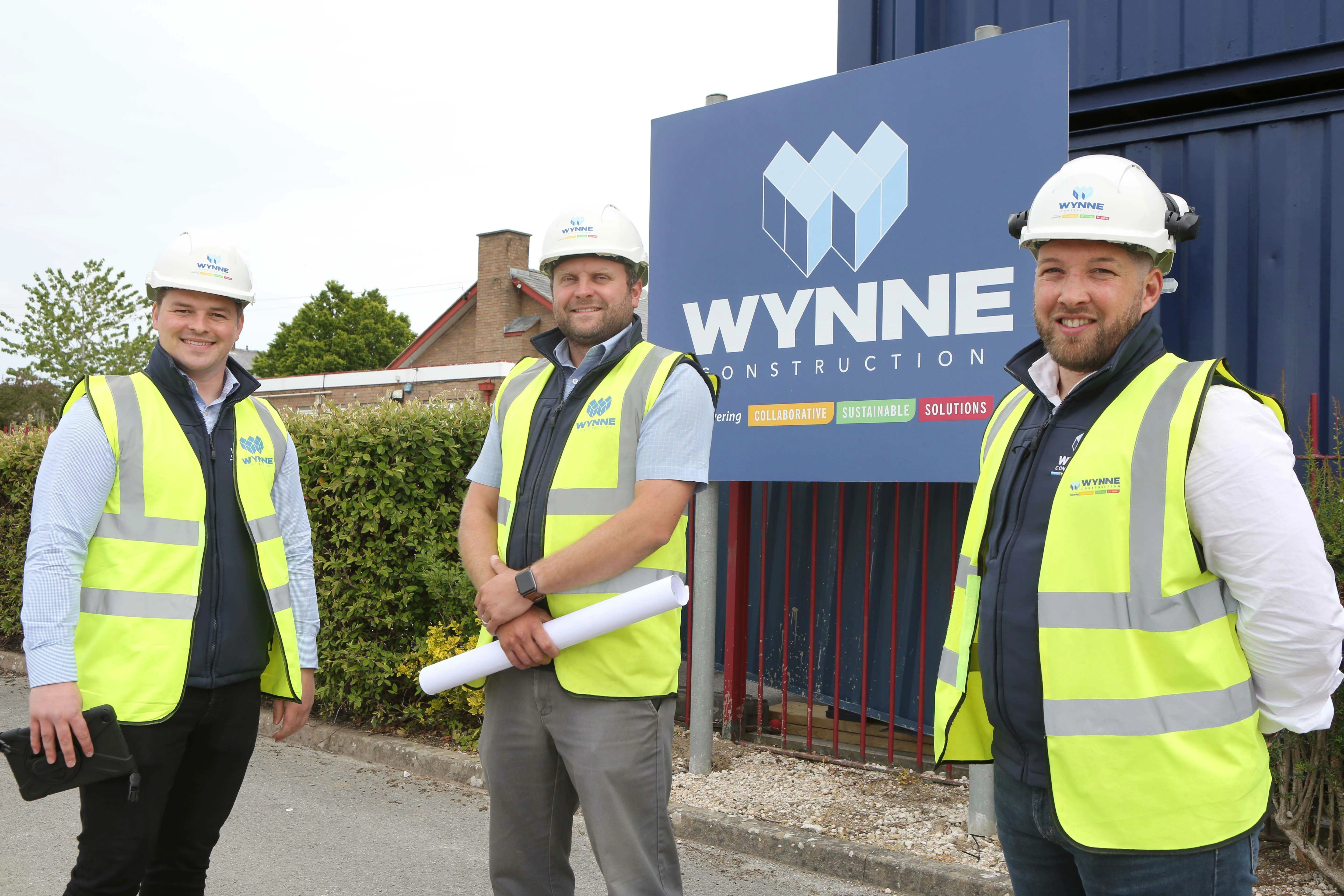 L-R: Wynne Construction Quantity Surveyor Tom Hocknell, Project Manager Mark Wilson and Site Manager Liam Jones at the Ysgol Brynffordd site.