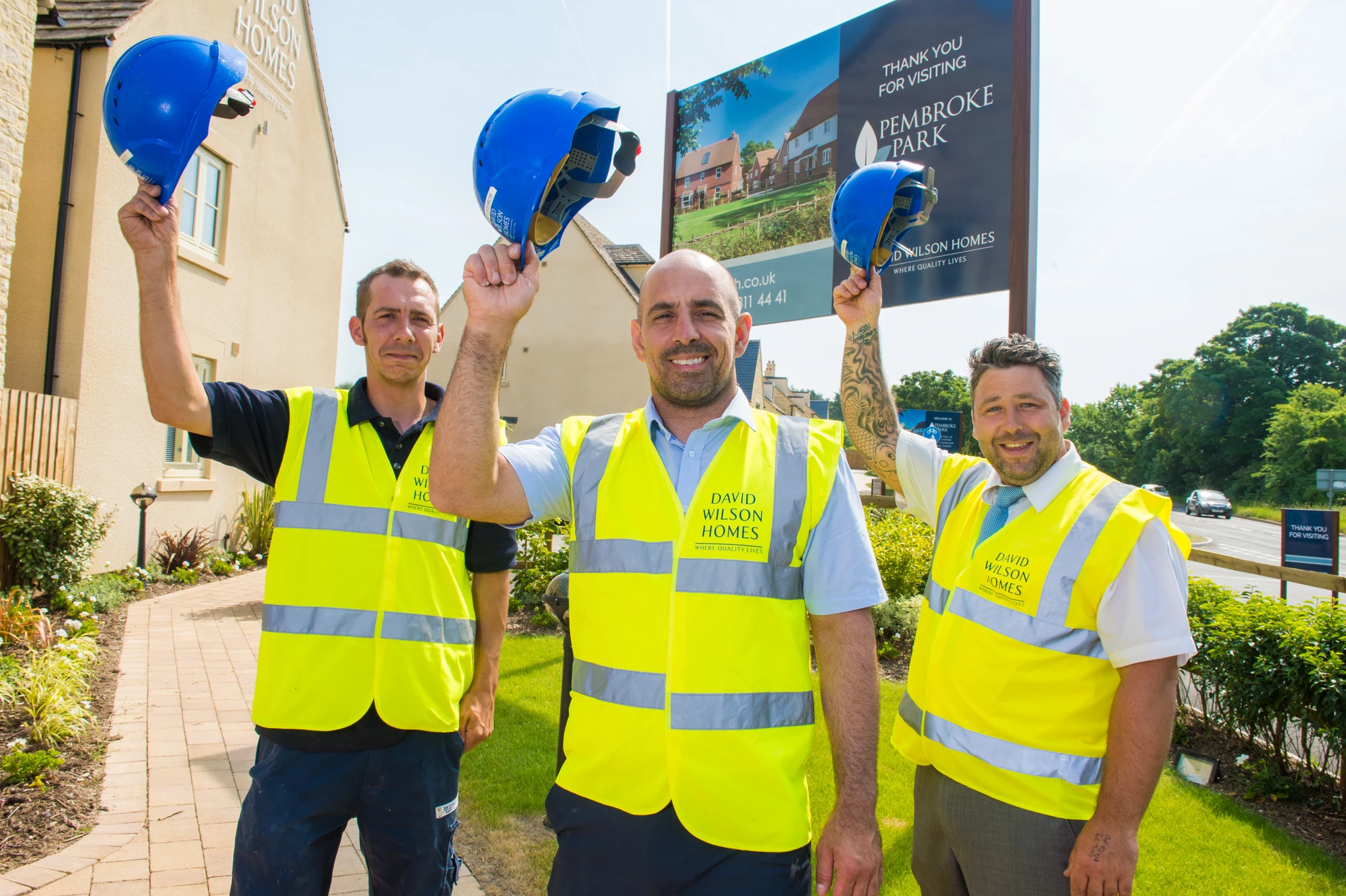 Hats off to award-winning David Wilson Homes site manager Claudio (centre) with colleagues John Meikle (right) and Scott Turner (left)