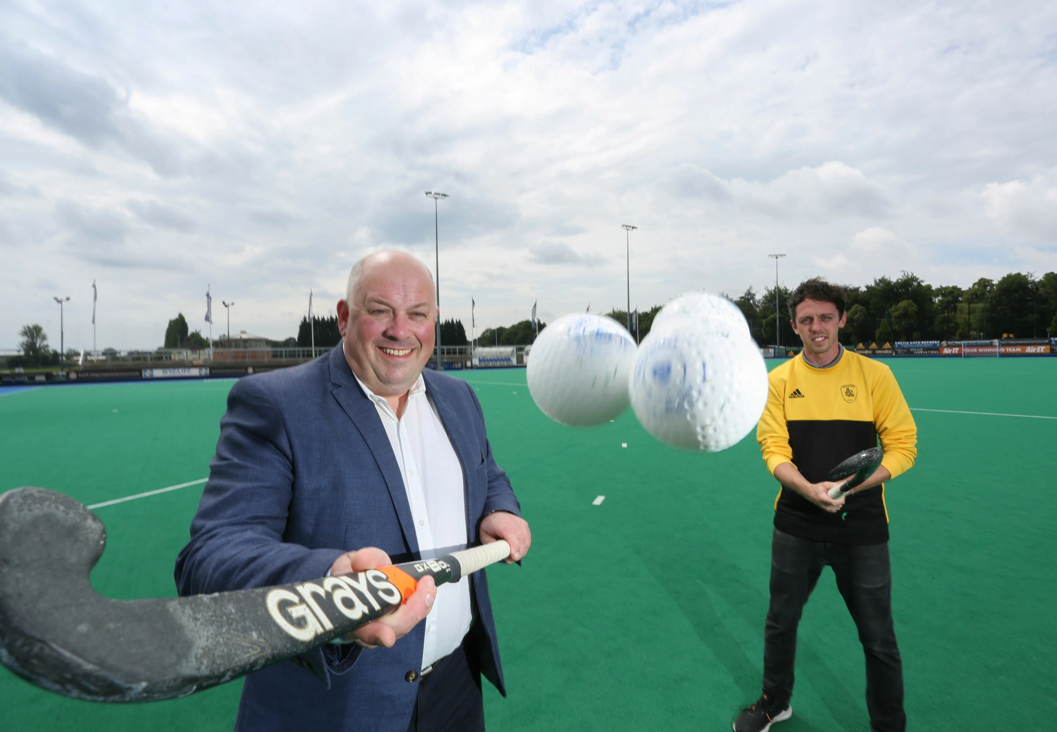 Mike Dickinson, Sales & Marketing Director at Russell Scanlan with Adam Milsom, Club Treasurer of Beeston Hockey Club