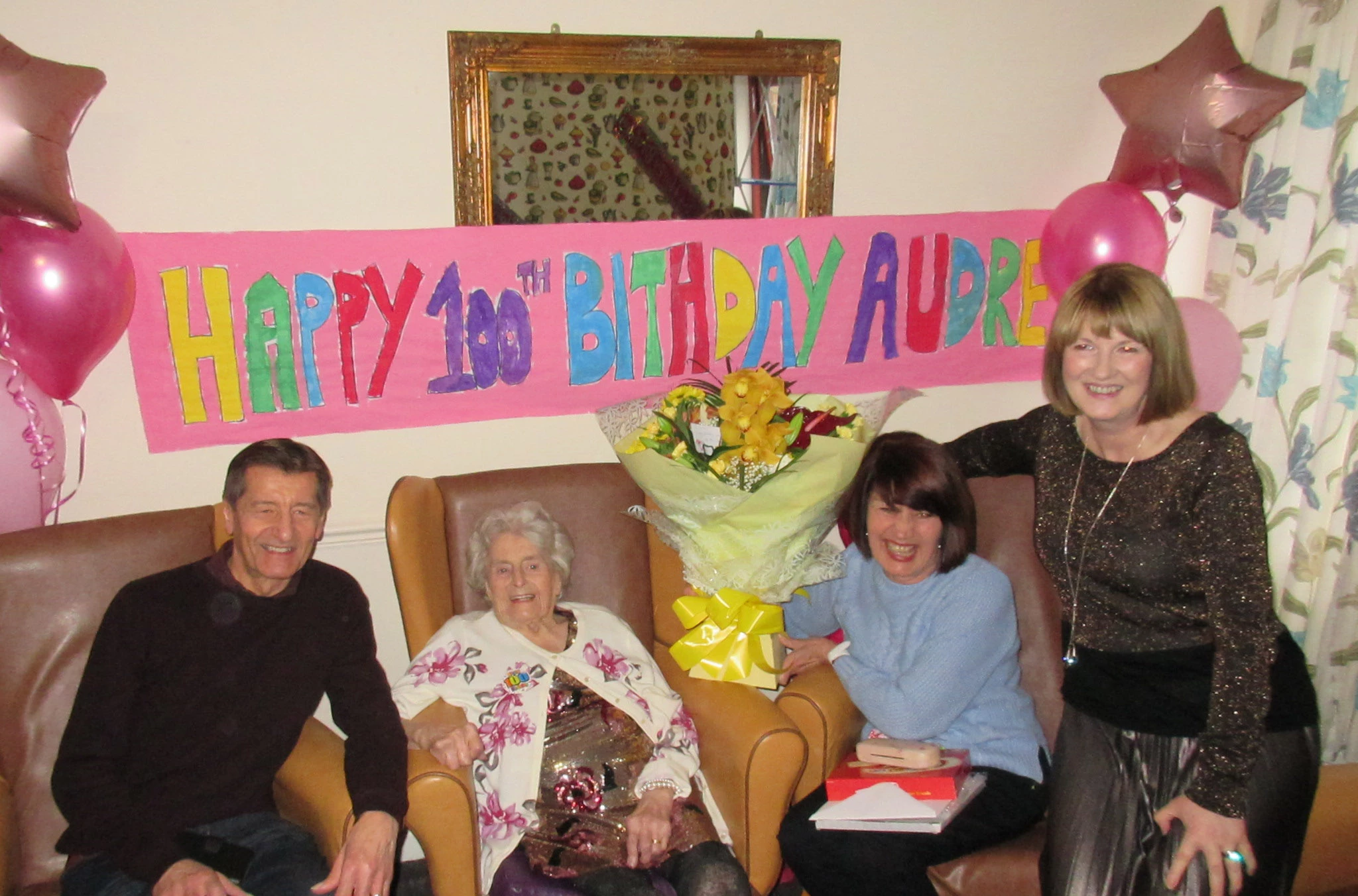 Audrey with family members