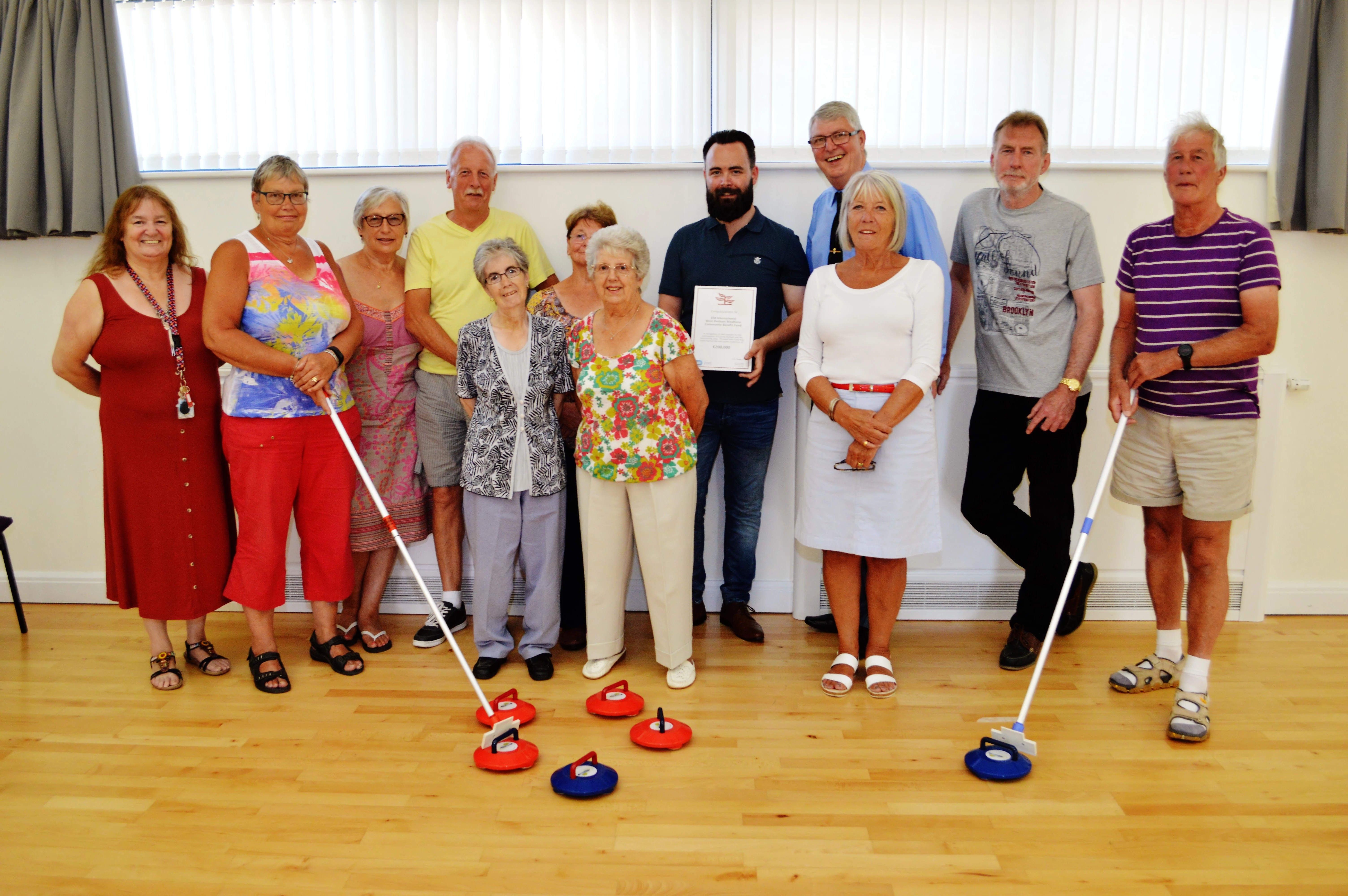 Rhoda Makepeace from Hamsteels Community Association with members from the Kurling Club with Paul Lally from ESB, James Eaglesham from CDCF and other panel members from the ESB West Durham wind farm