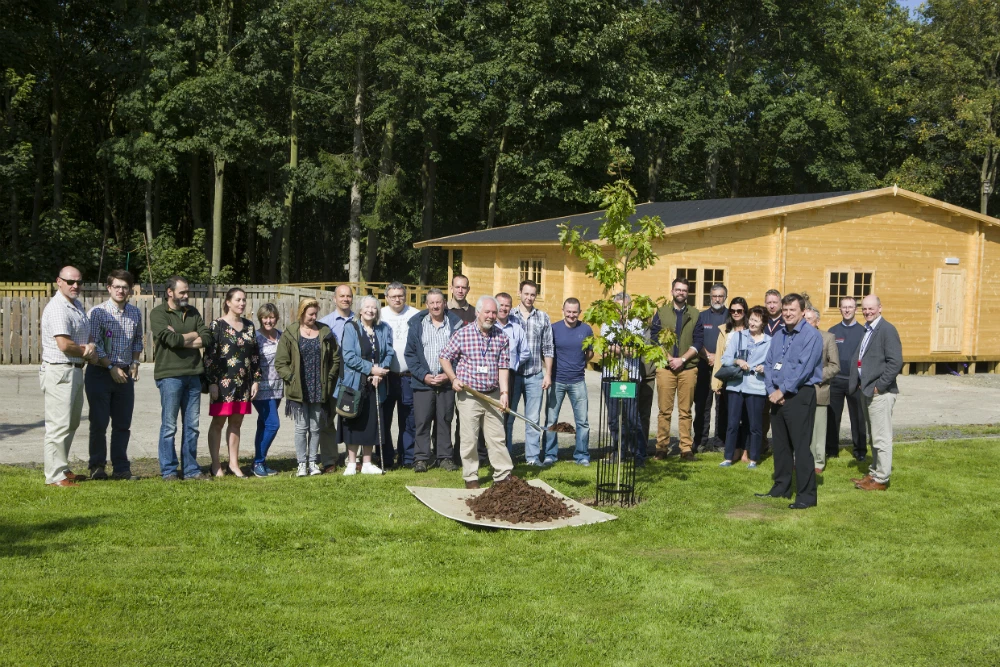 A tree is planted at the new Woodland Centre at Kirkley Hall to commemorate the launch of the Northumbria Veteran Tree Project.