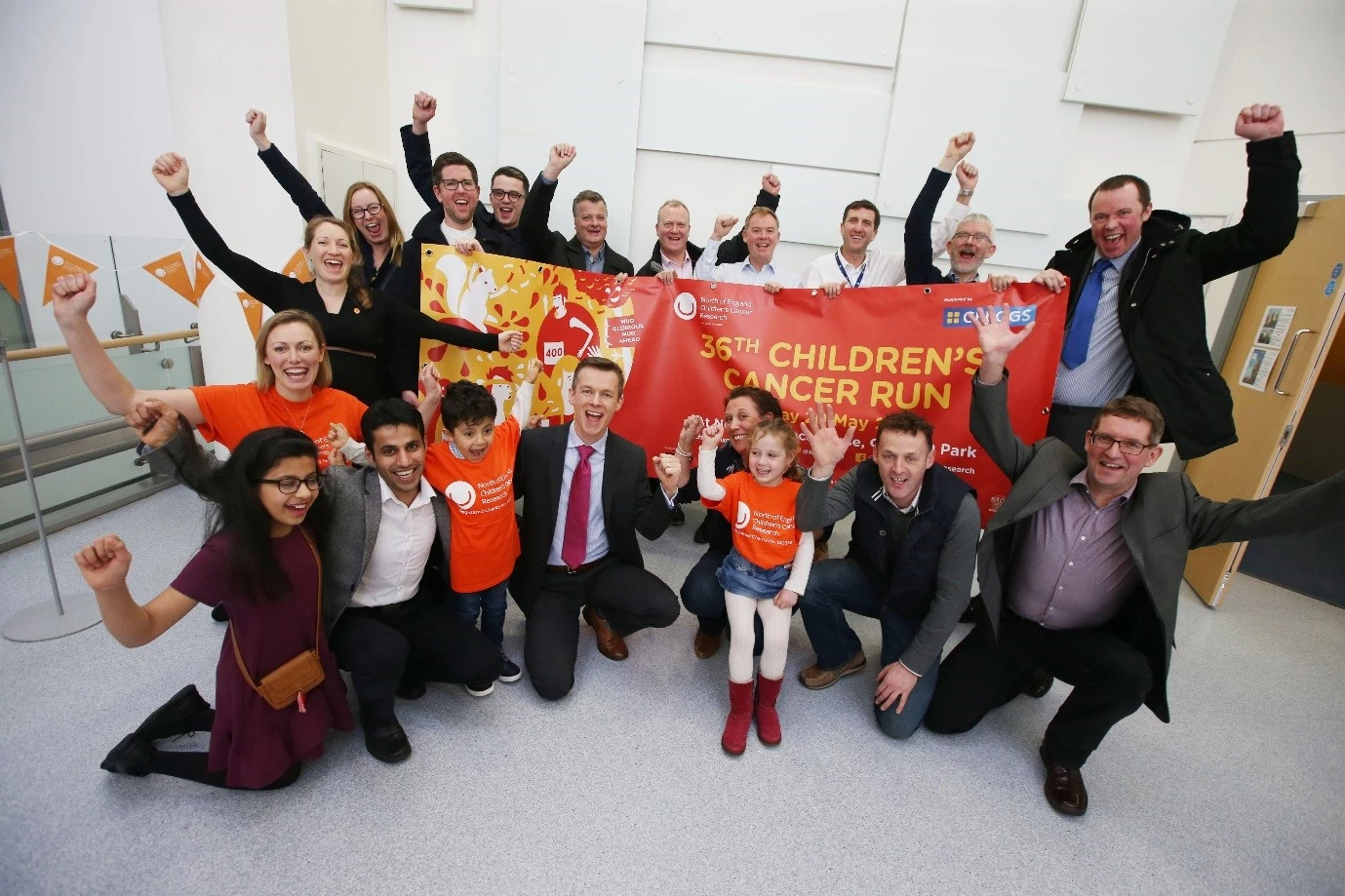 Former cancer patients, Fahad Alateef and Holly Brough, with corporate supporters and the NECCR team launching the 2018 Children's Cancer Run