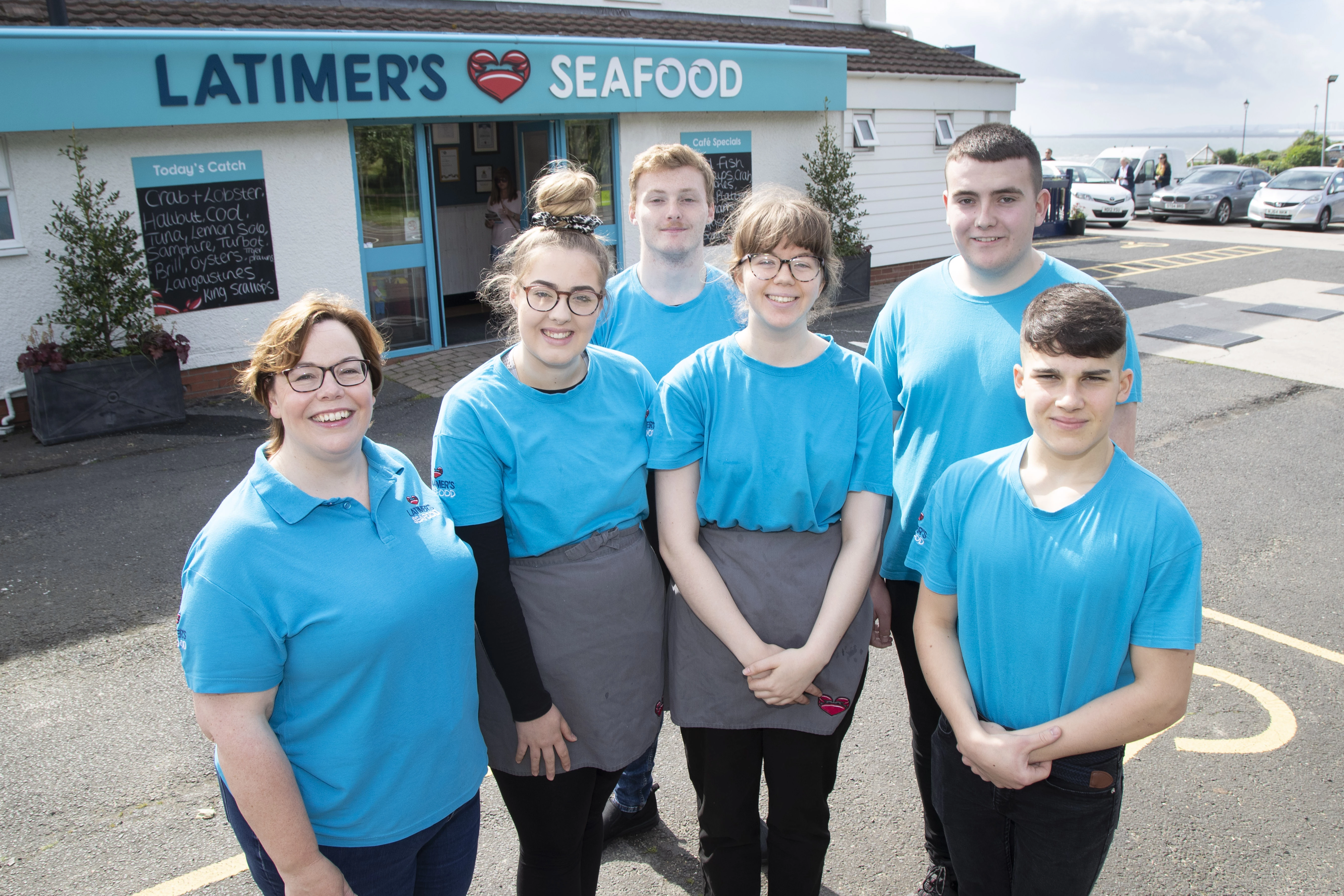 From left to right: Ailsa Latimer with five of the new starters, Katey, Aaron, Sophie, Harry and Alec.