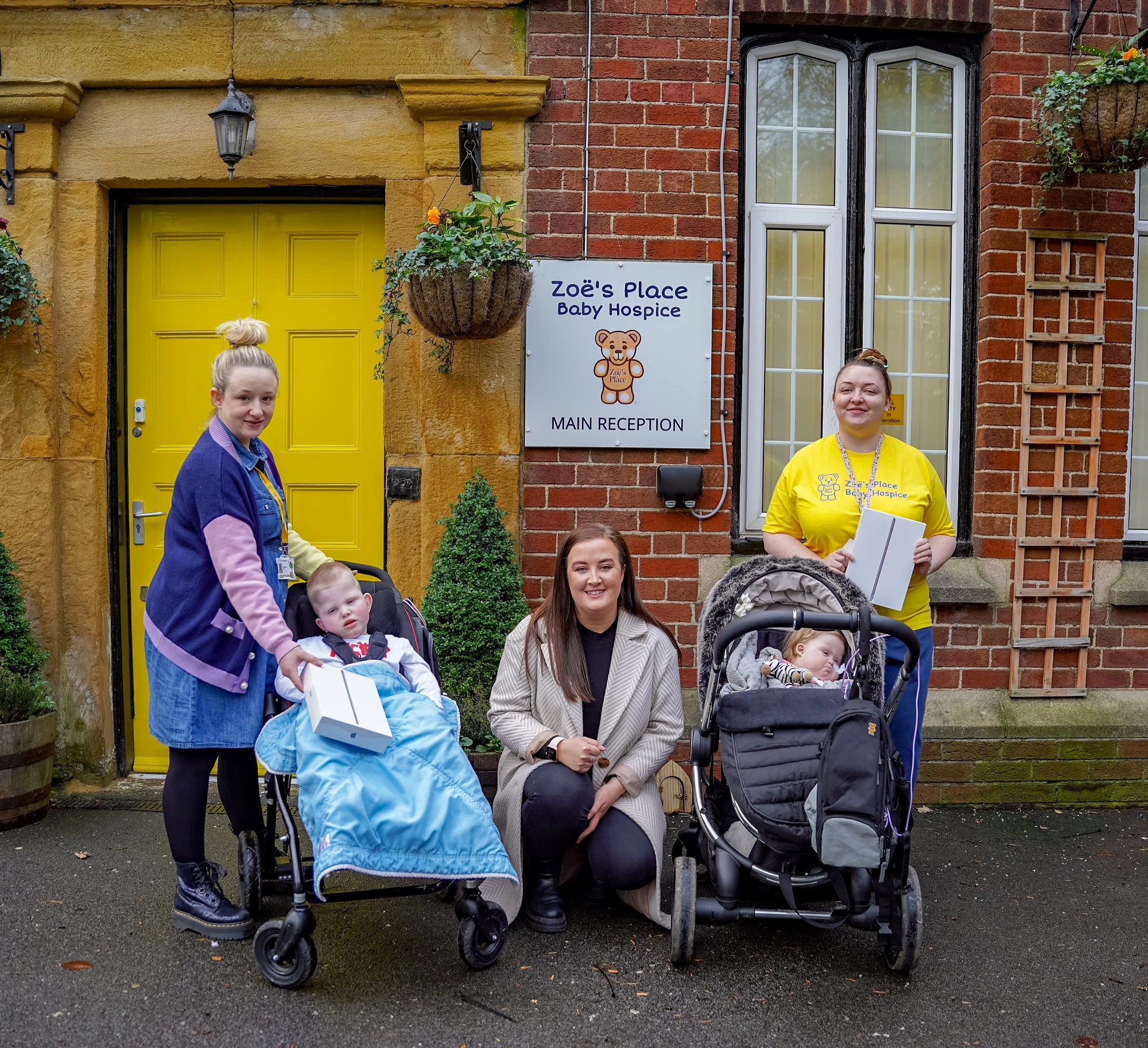 The team at Zoë's place with Sarah Heward, project lead at Tech Equal