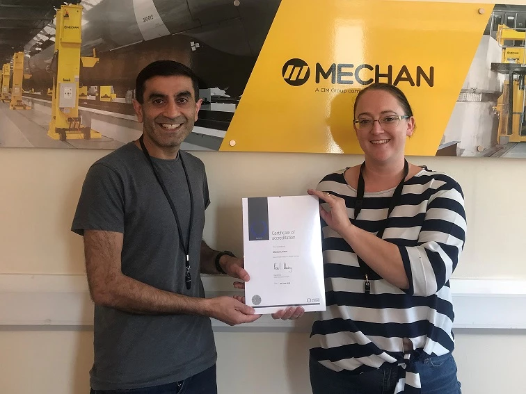 Director, Zahir Altaf and sales manager, Lindsey Mills, celebrate Mechan's Investors in People reaccreditation. 