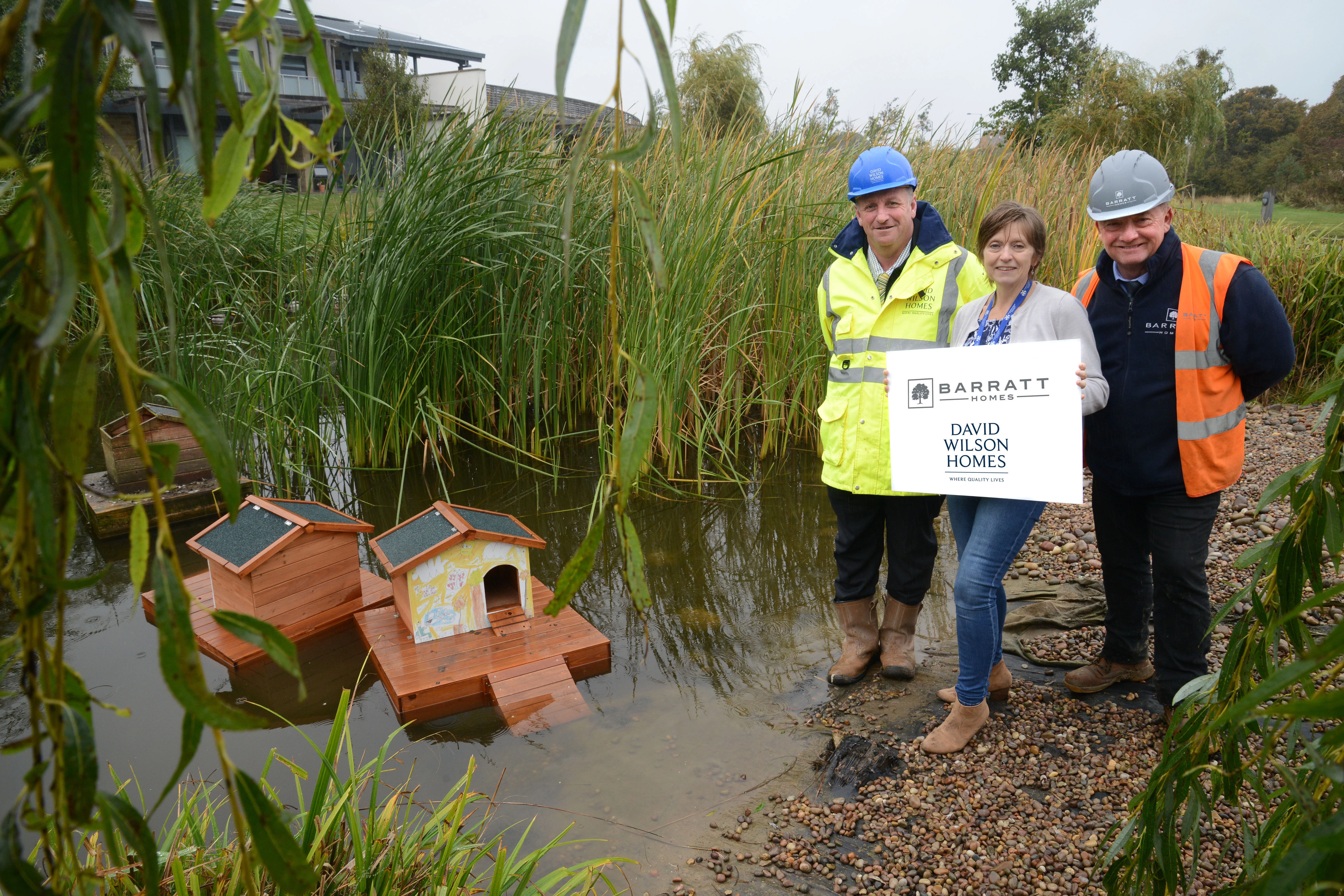 Catrina Flynn os St. Benedict's with DW site manager David Jamieson and Barratt Senior Site Manager Kevin Anderson 