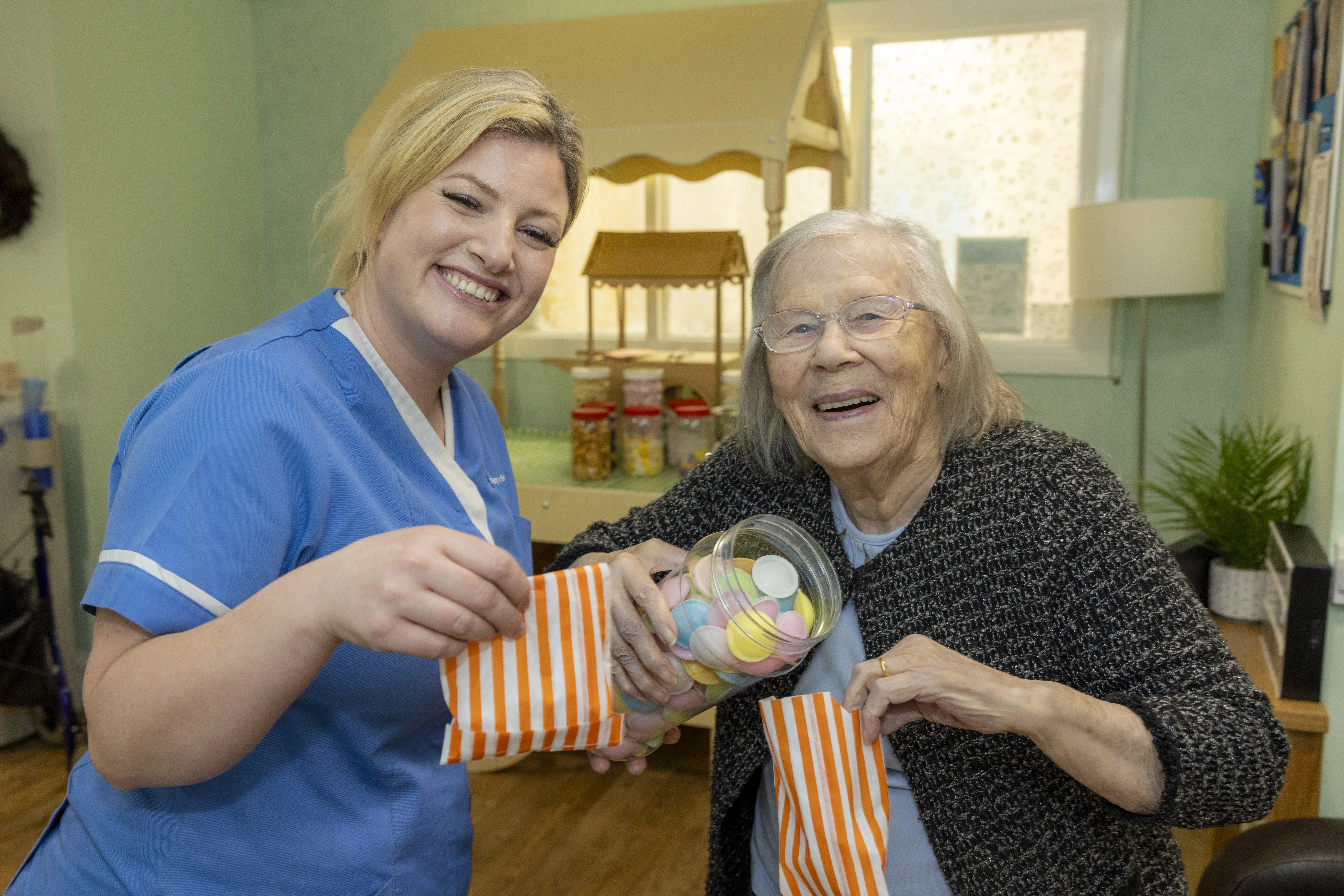 Jeanette measuring out sweets at Primrose Hill Care Home