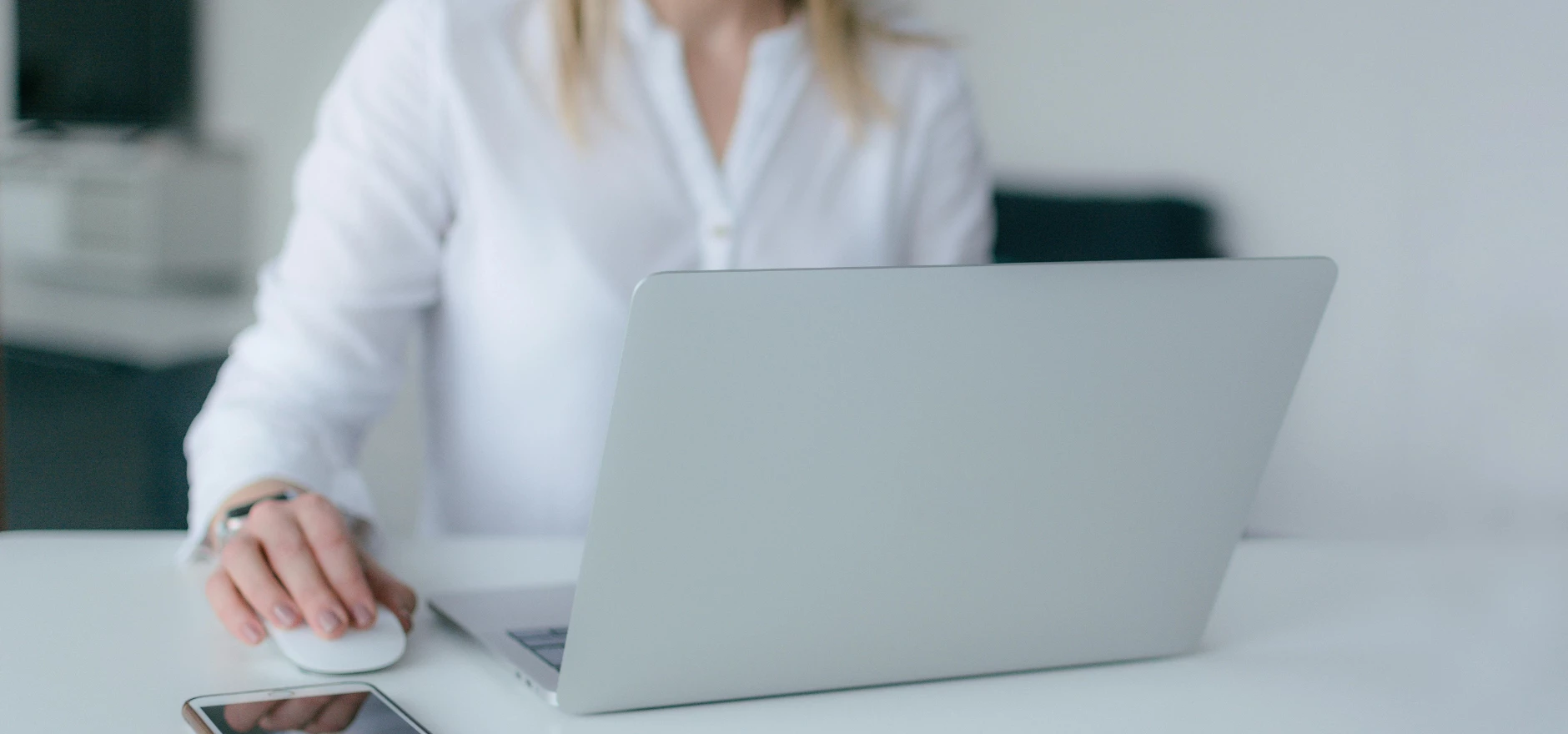 Woman Using Silver Laptop