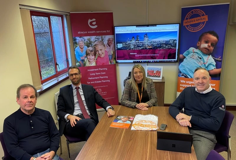 From left Nigel Round, Ben Dyas and Daniel Paton of Abacus Wealth Services, with (second right) VIcki Rowles, head of fundraising at Acorns Childrens Hospice