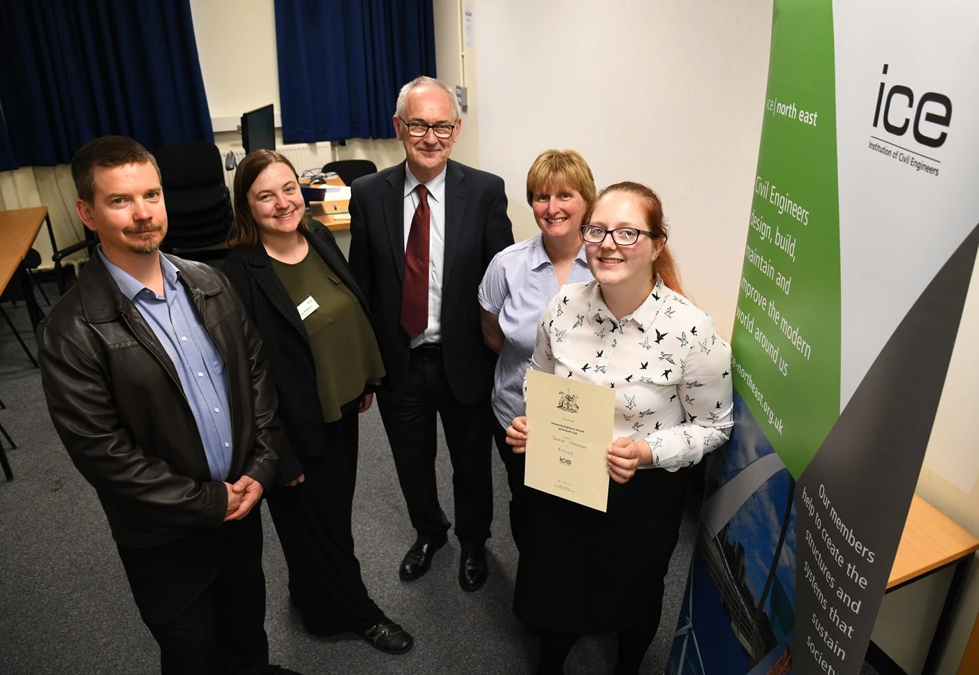 Jessica with her certificate and the expert panel of judges