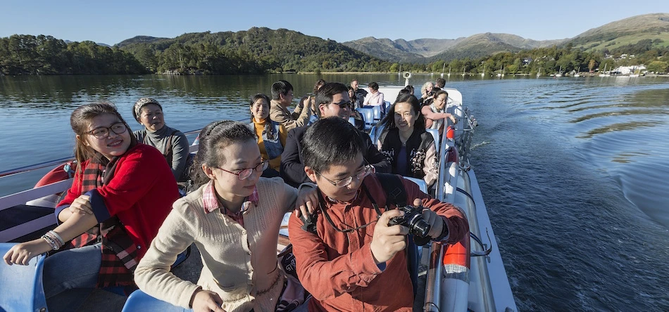 Chinese visitors taking in the sights at Windermere