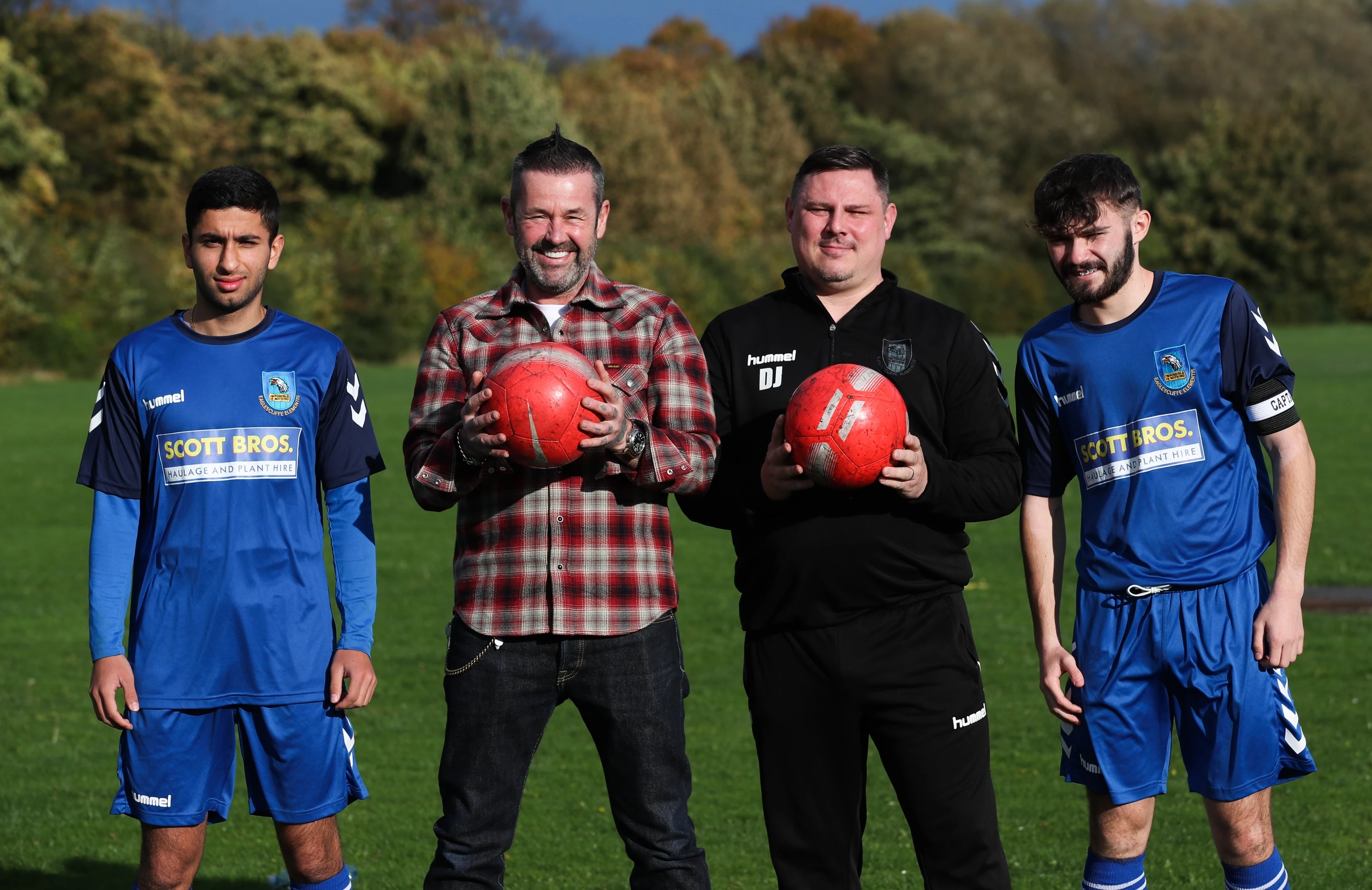  Players Ali Jamalipour and Ted Young show off their new kit with (centre left) David Scott Jr and (centre right) David Jones