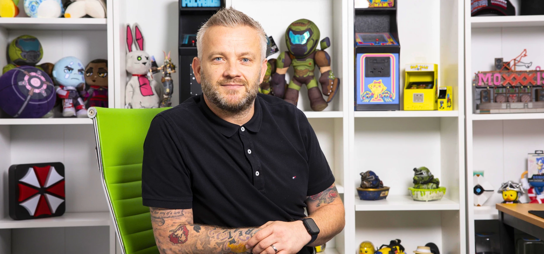 Ben Grant, Co-Founder of Rubber Road Ltd, pictured in front of the company's merchandise.