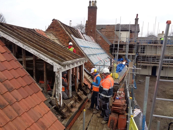 The roof at St Hugh's, Lincoln, being refurbished by Martin-Brooks. 