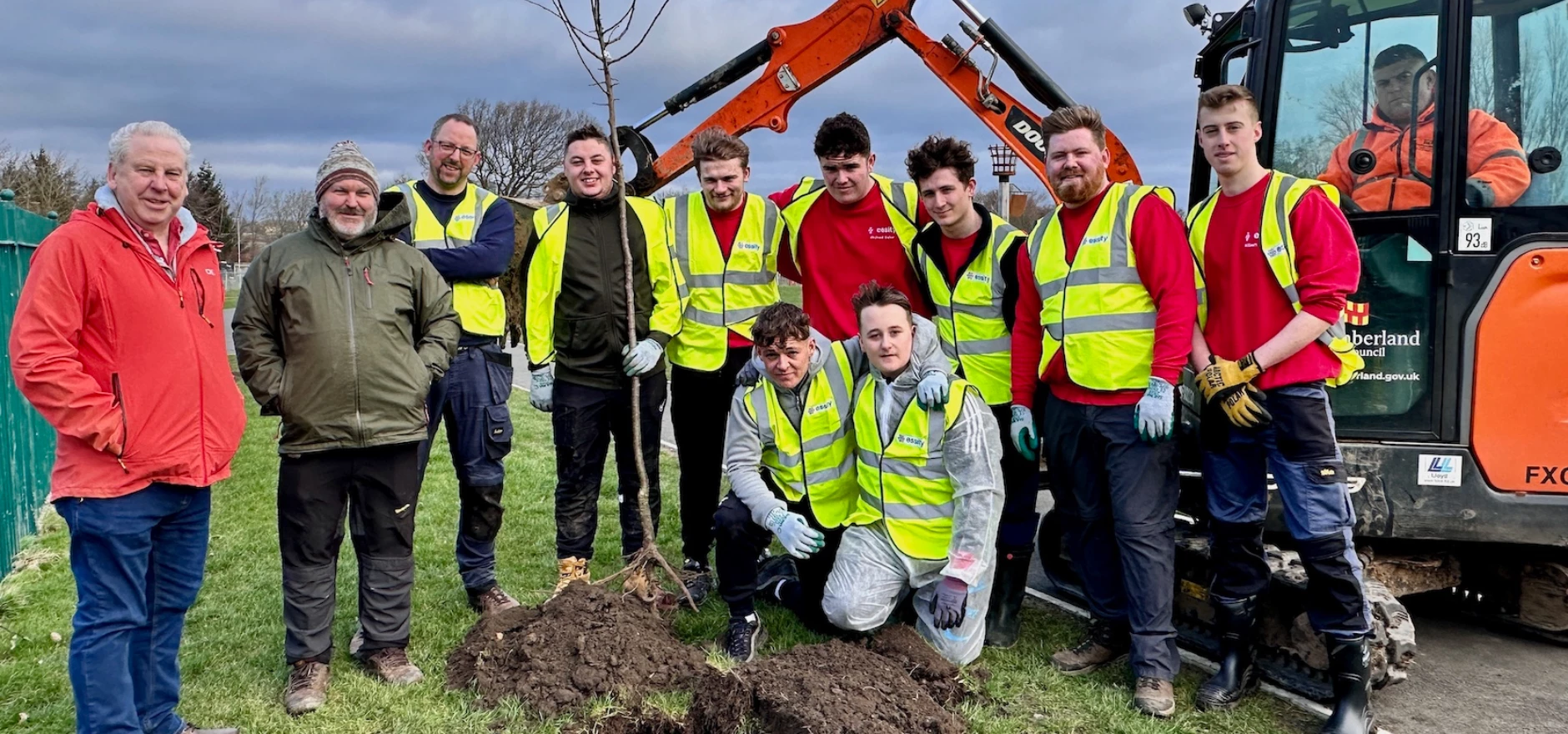 Essity apprentices pictured with (L-R) county councillor Gordon Stewart, Russ Greig and Essity's lead electrical trainer Mark Horner.jpeg