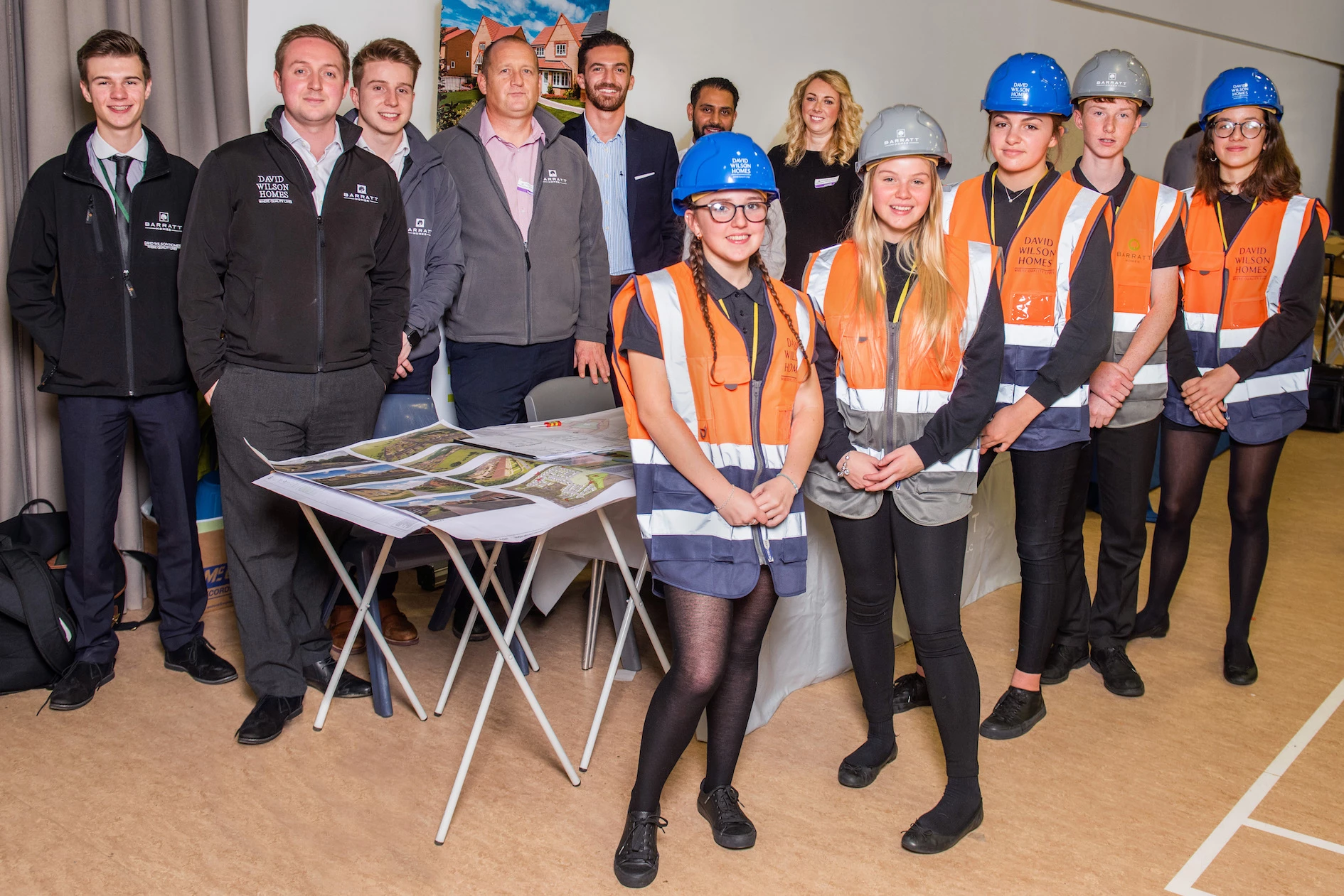 The team from Barratt Developments visiting pupils from Beckfoot School