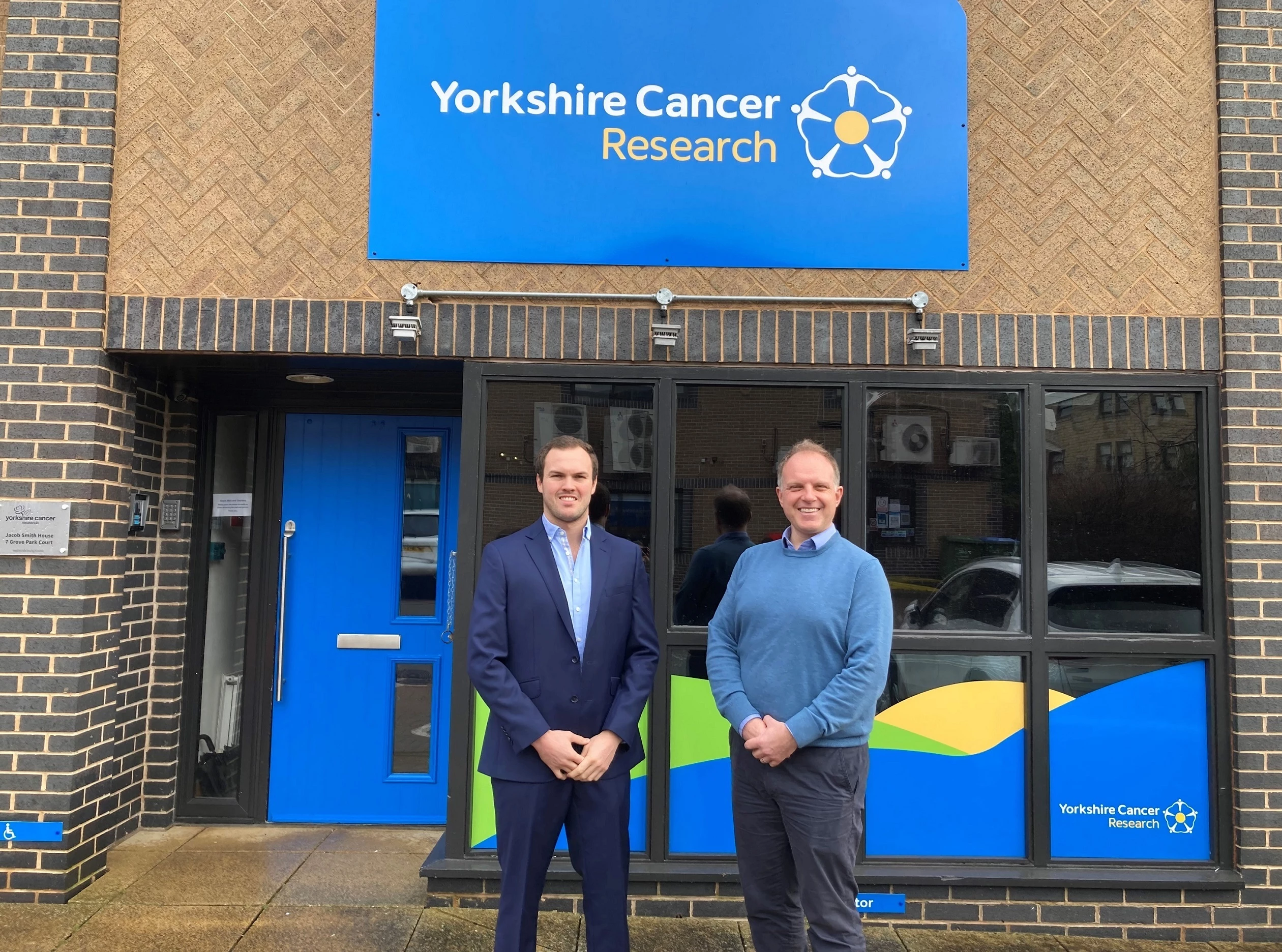 Carter Towler's Max Vause and Tony Graham of Yorkshire Cancer Research 