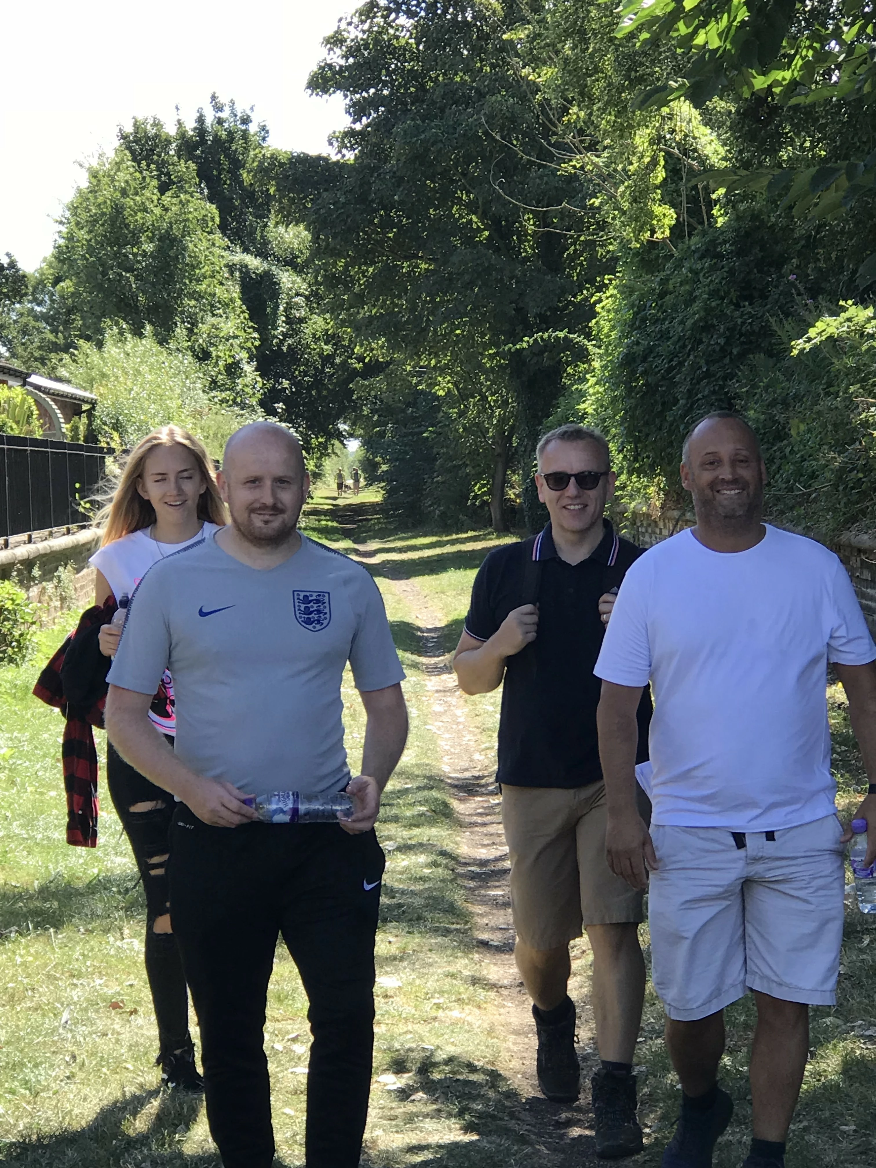 Managing director Terry Peel (Far Right) and quality assurance manager Mark Green (Right) complete the walk with friends