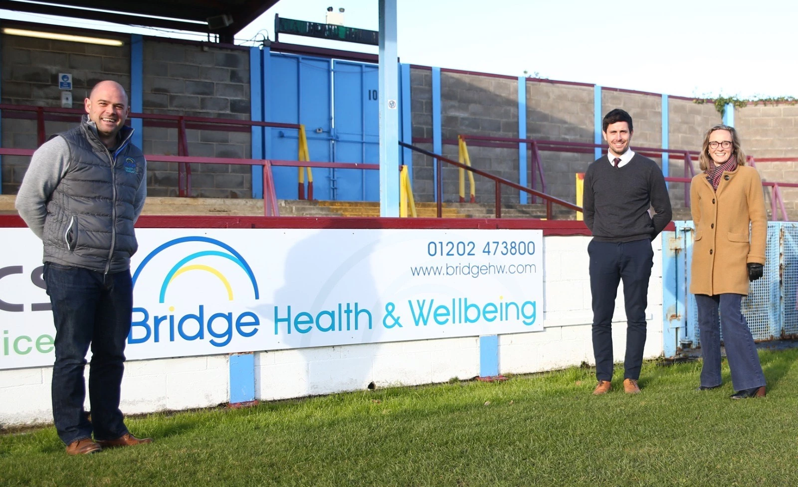 Paul & Louise O'Connell of Bridge Health & Wellbeing with Brian Stock, First Team Manager at Weymouth FC