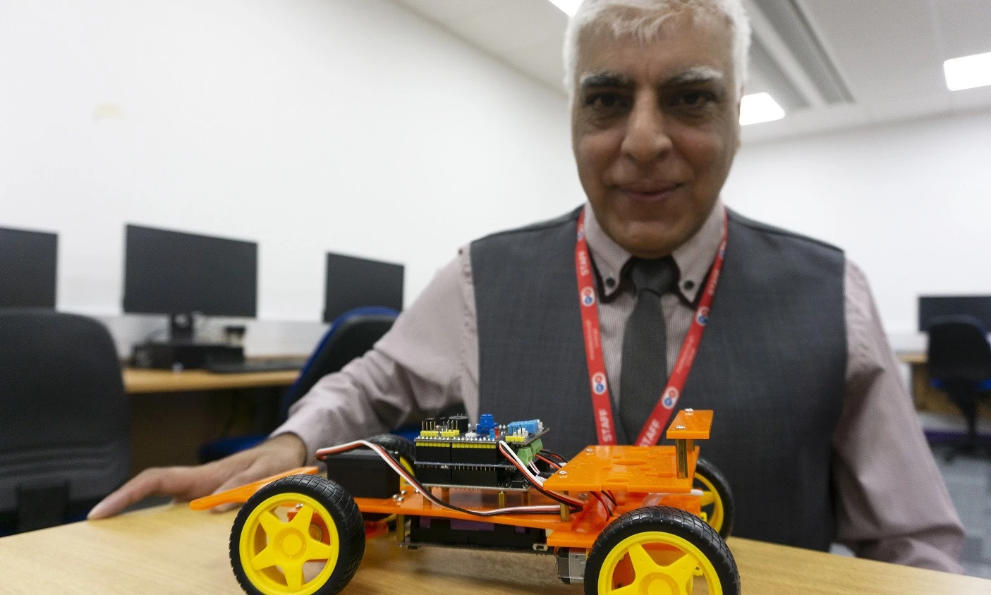 Anwar Bashir with the SmartCar