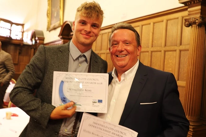 Martin-Brooks apprentice, Korneliusz Kasa (left), celebrates his award win with managing director, John Elmore. 