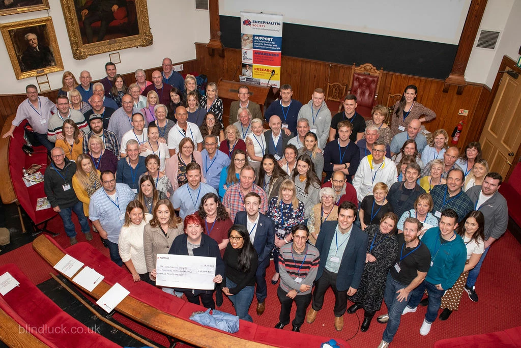 Founding LSL members present the cheque to Dr Ava Easton at the Encephalitis Society’s annual My Brain, My Story event