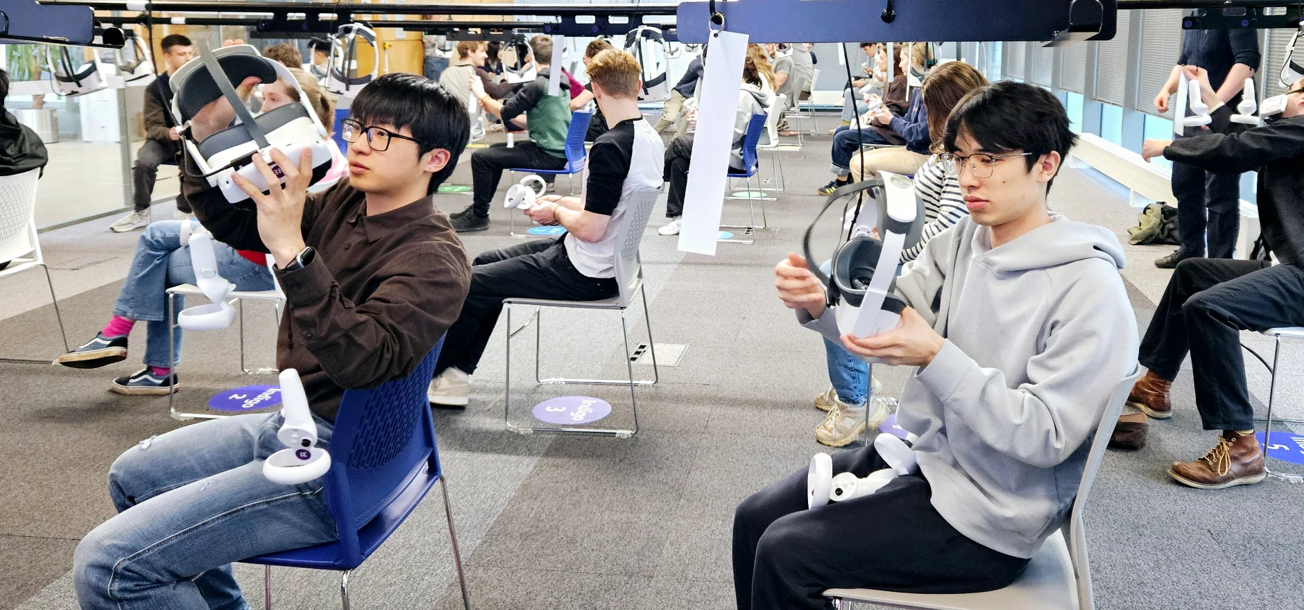 Students using Virtual Reality headsets