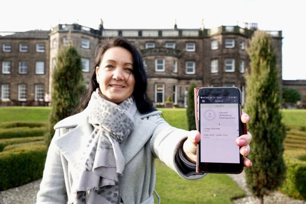 Olga Wormald of NOW Consultancy outside Warner Leisure Hotel’s Nidd Hall, with the Rotaready app 