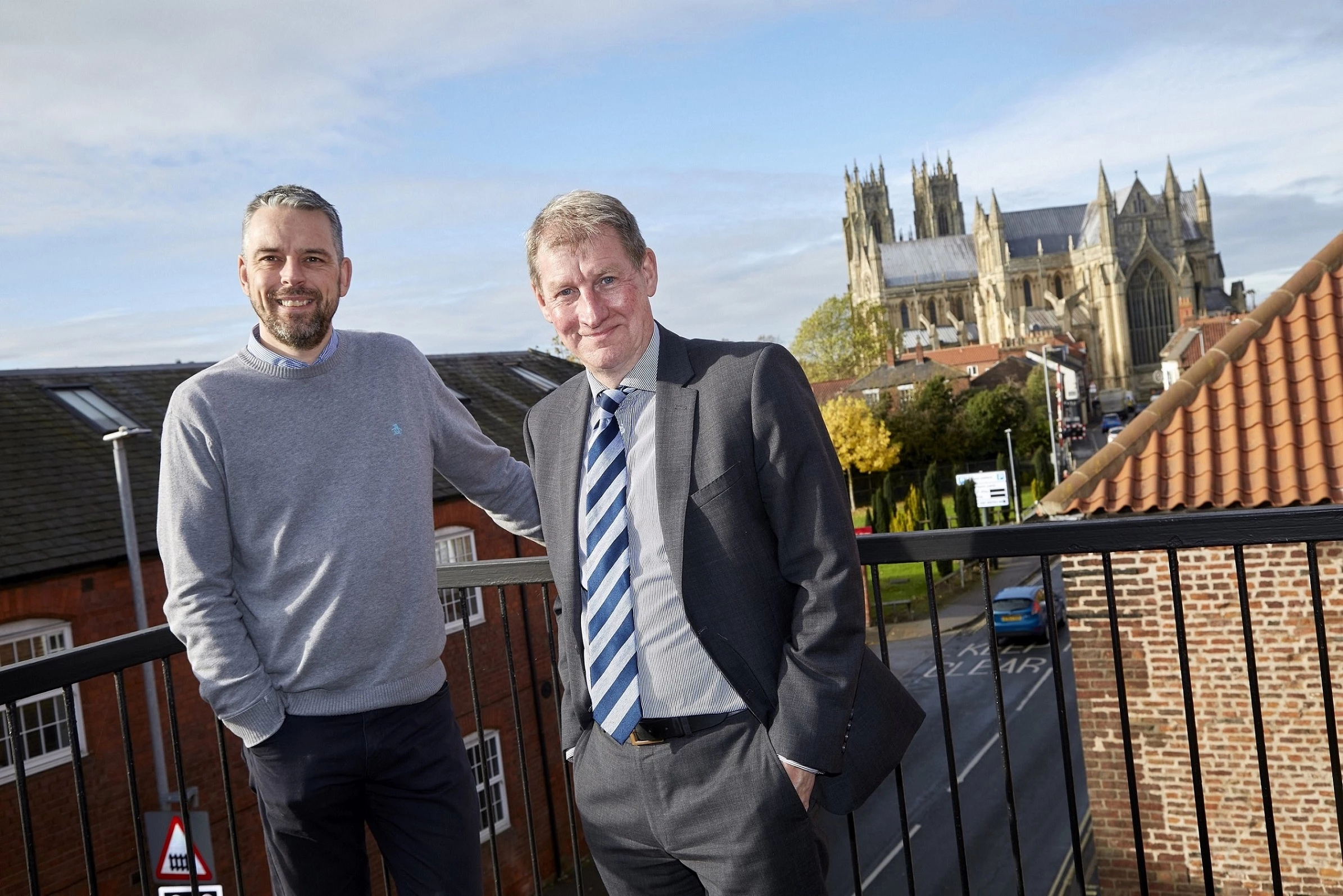 (L - R): Neil Theobald of Miller Graphics UK with Wykeland’s David Donkin on Miller Graphics’ balcony area on the top floor of Minster House.