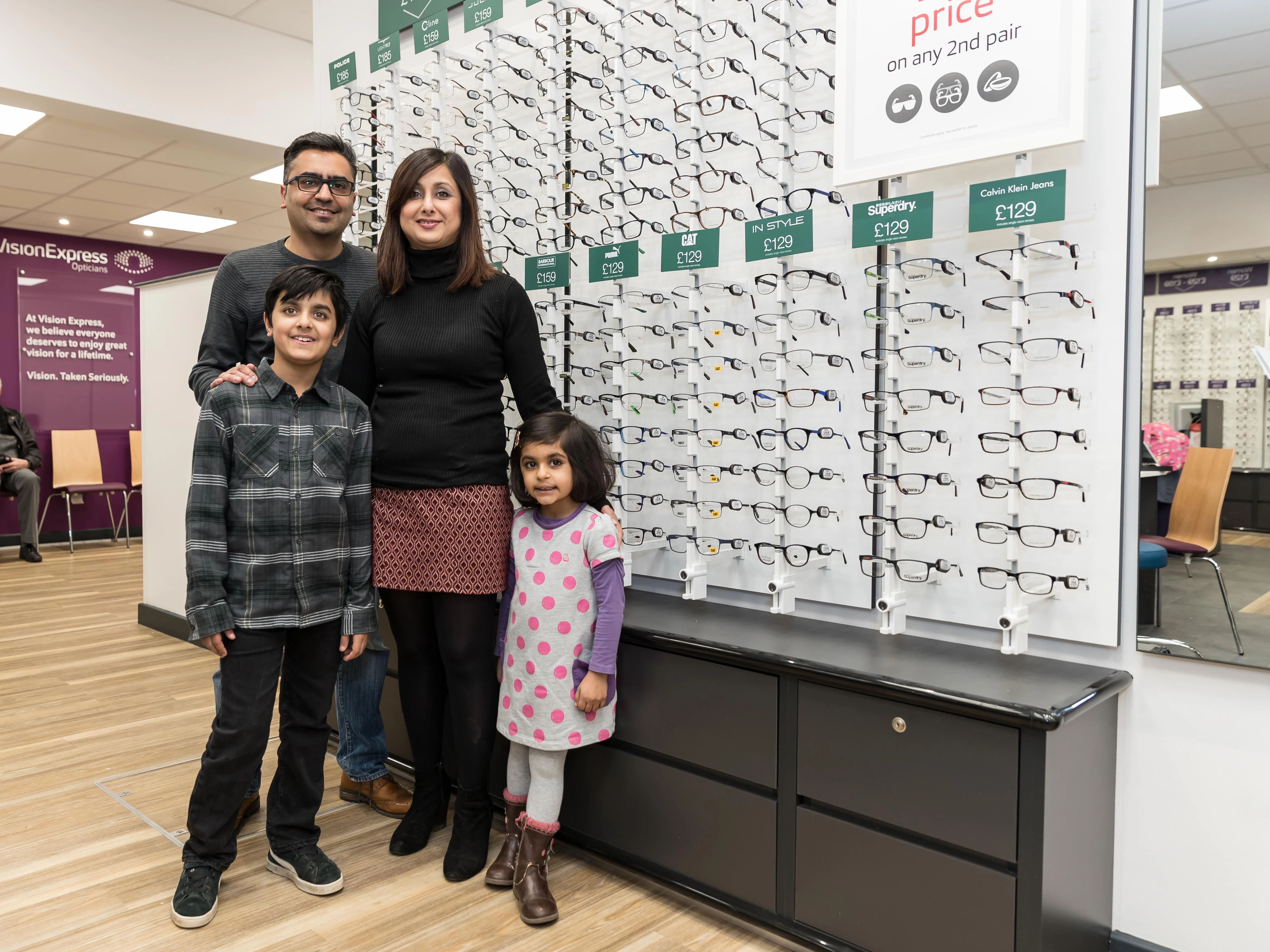 Youngster battling rare Stargardt’s disease officially opens new optical store in Cheshunt