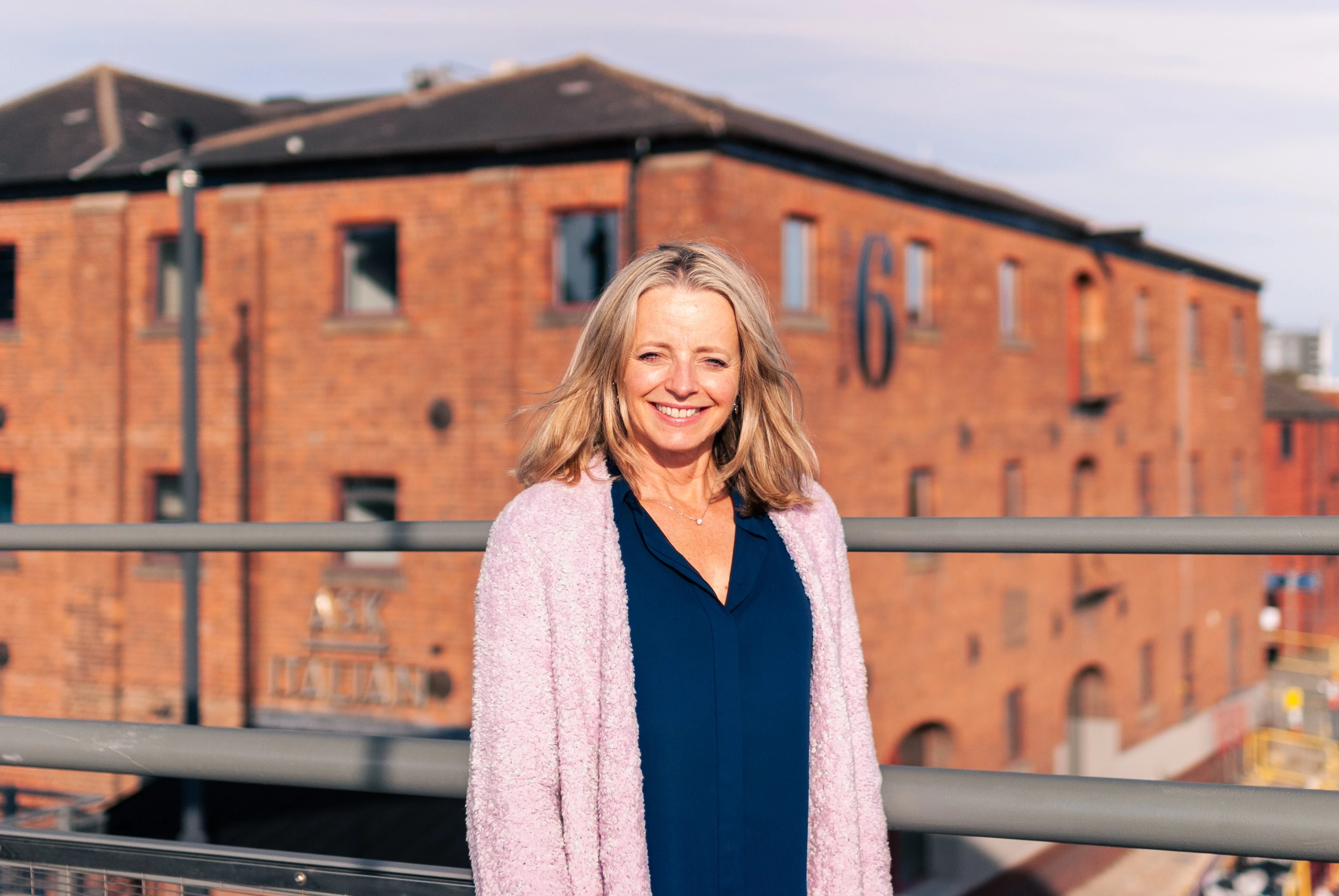 Pace's Managing Director, Anita Pace, stands in front of the marketing agency's new offices.