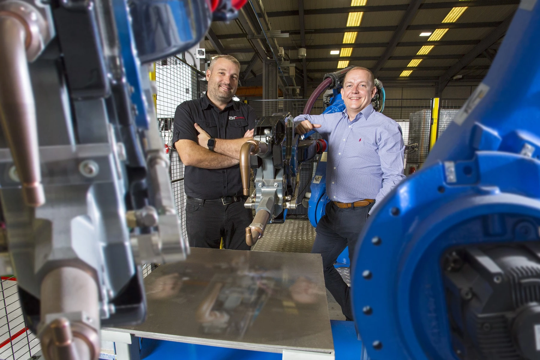 Andrew Ramsey (AR Controls) and Giles McCourt (Muckle) with AR Controls’ robotics technology.