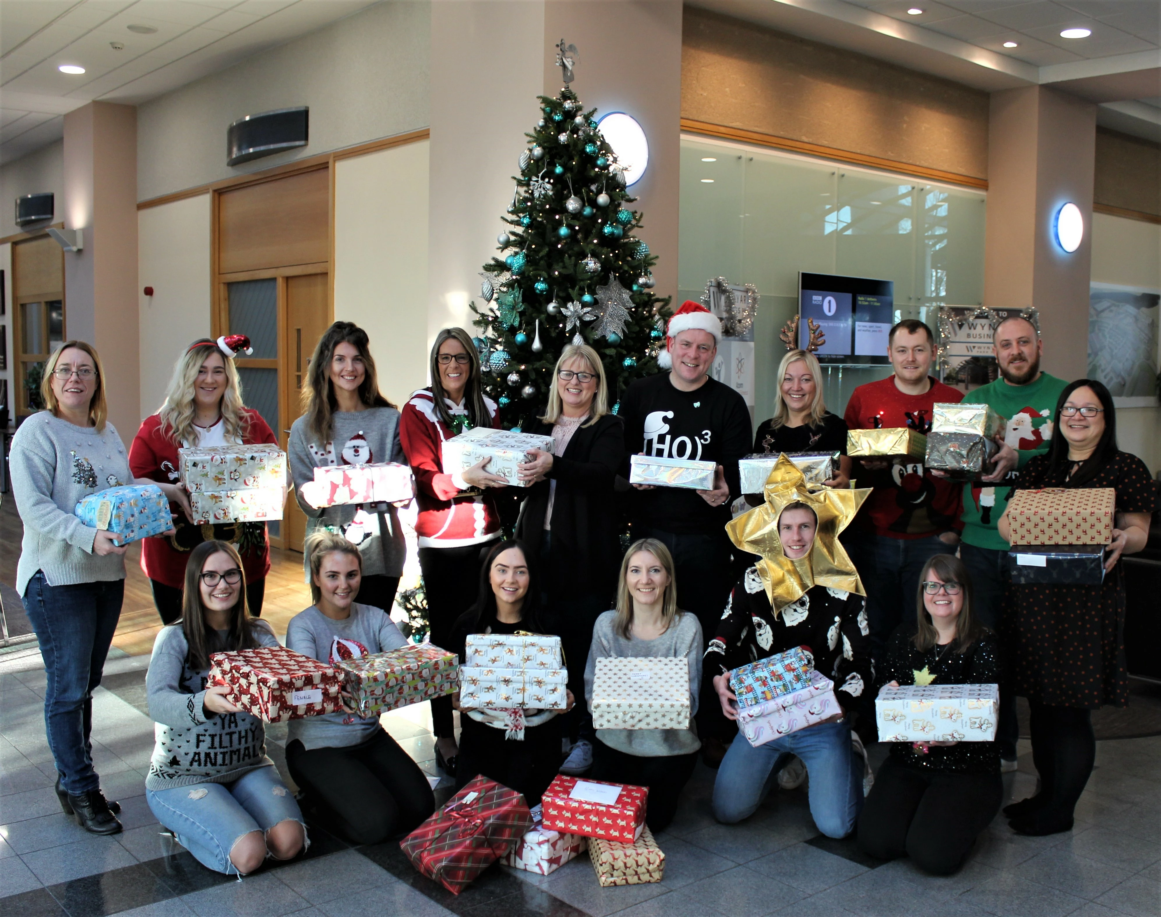 Staff at Baldwins donating their Christmas shoeboxes to Mandy Shields, events manager at the Middlesbrough & Teesside Philanthropic Foundation