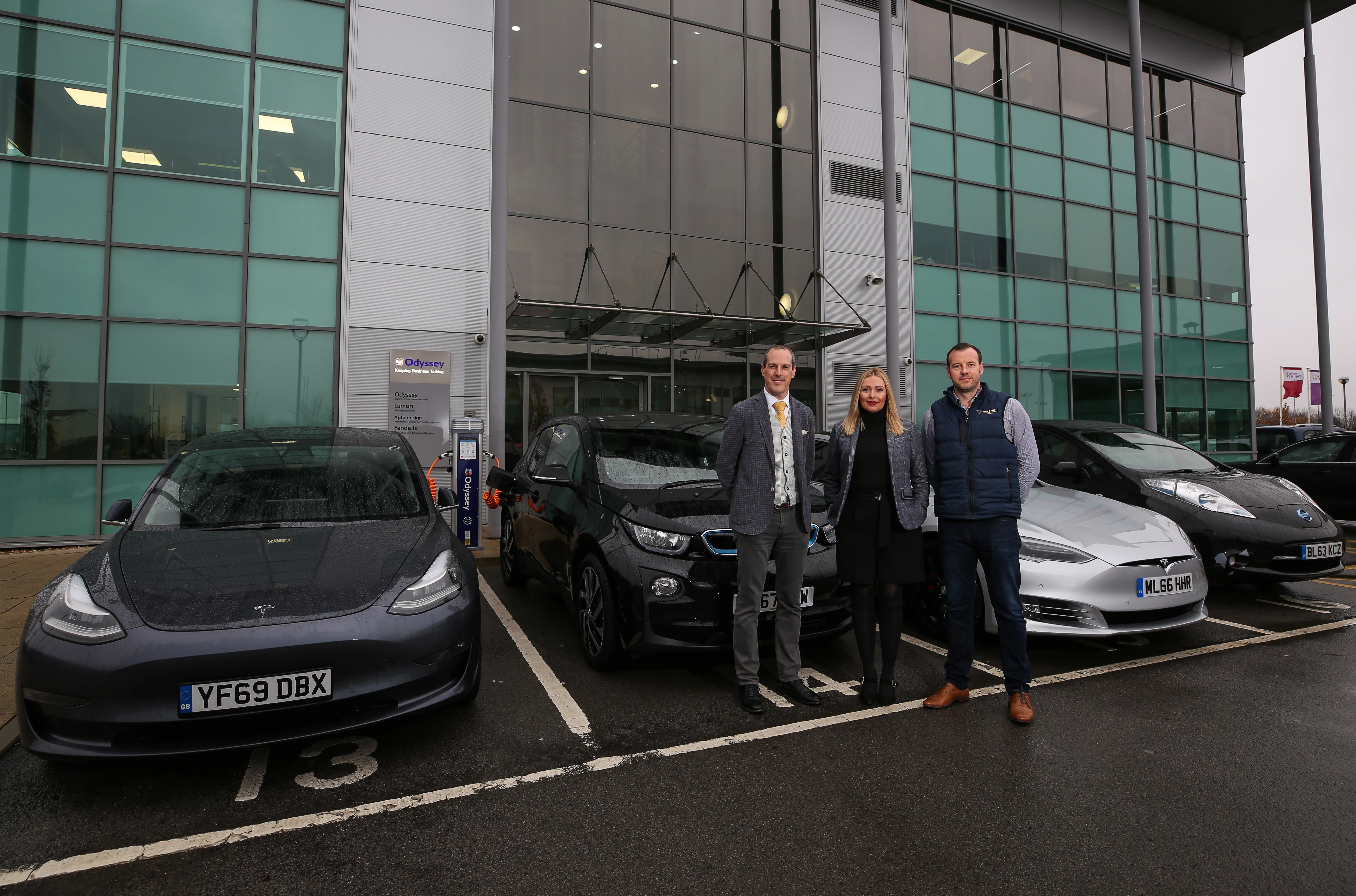 (L-R) Andrew Middlemiss, Jennifer Mullen and David Mullen, managing director of JDM Earth, with the new rapid charger